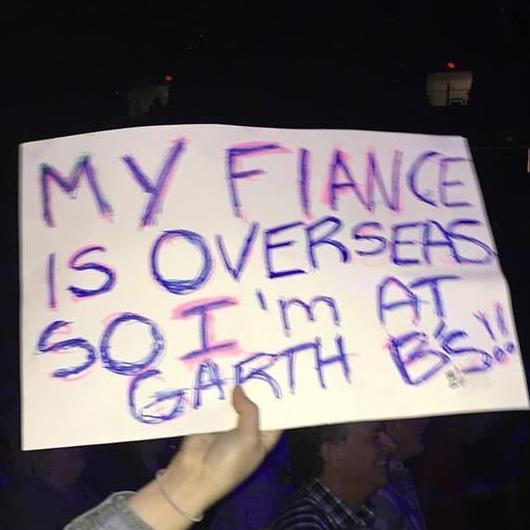 While Roy was deployed, Mica was "forced" to go have fun at a Garth Brooks concert.