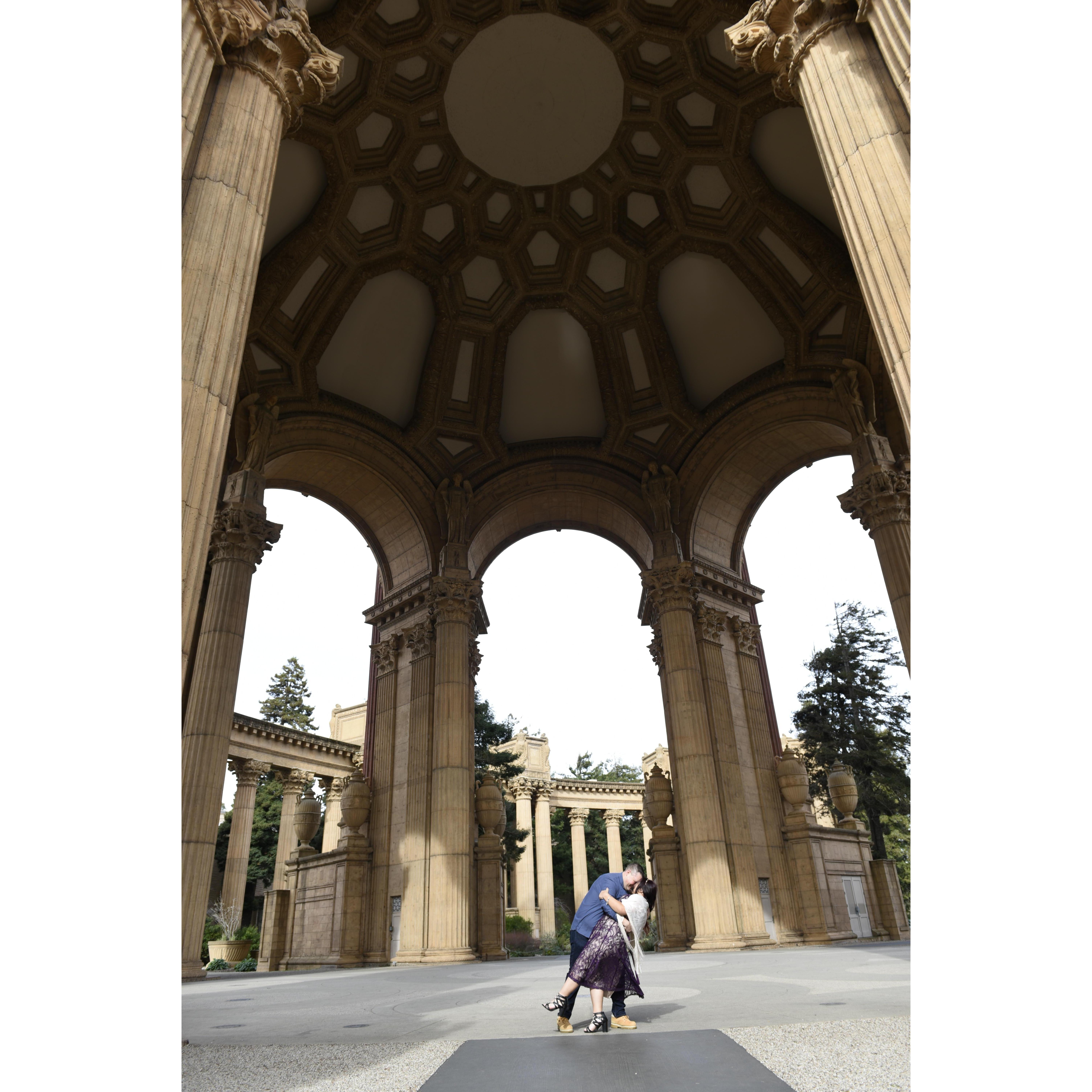 The photo was taken at the Palace of Fine Arts in San Francisco by our photographer Melika D. during our engagement photoshoot on January 15, 2020.