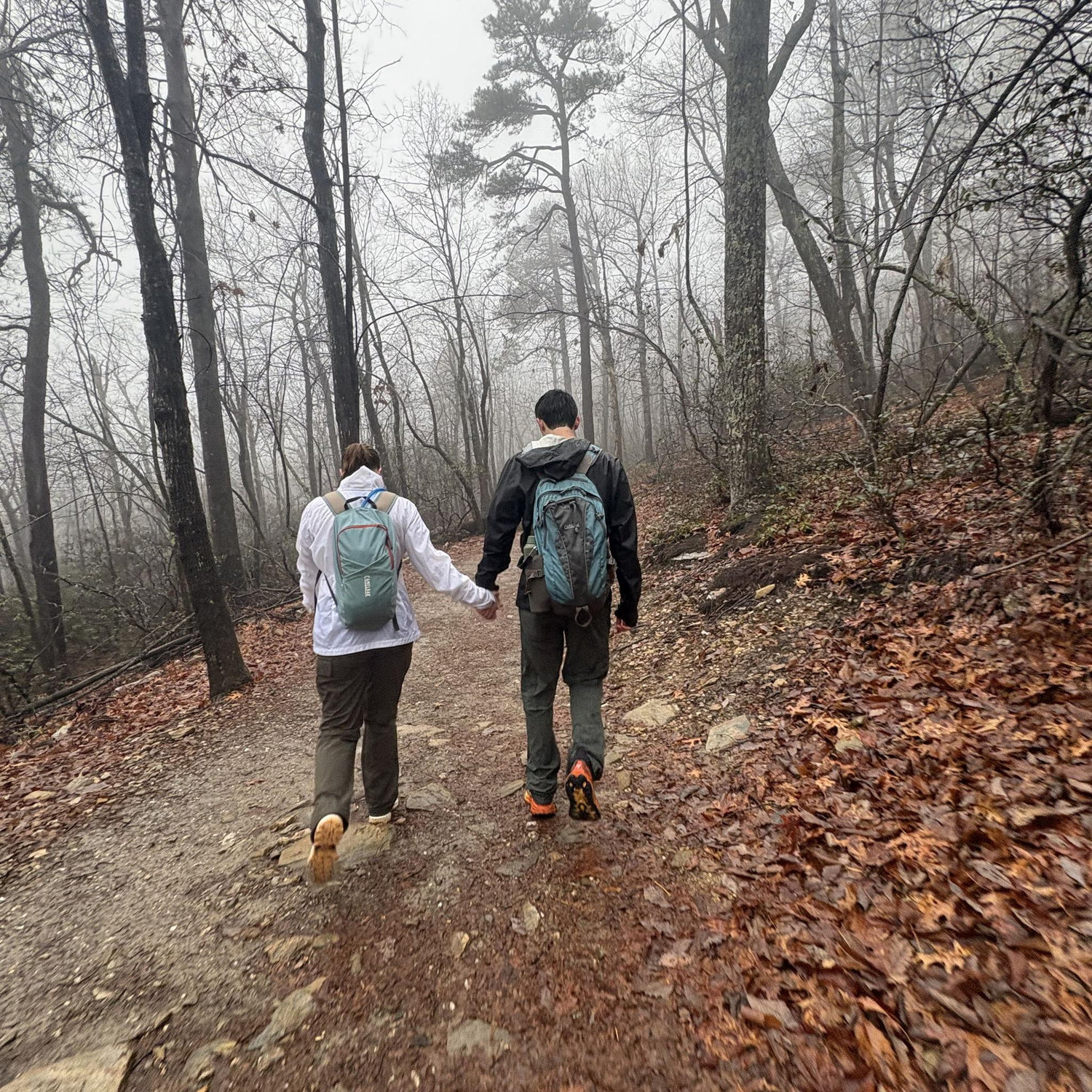 Walking back in the rain after getting engaged!!