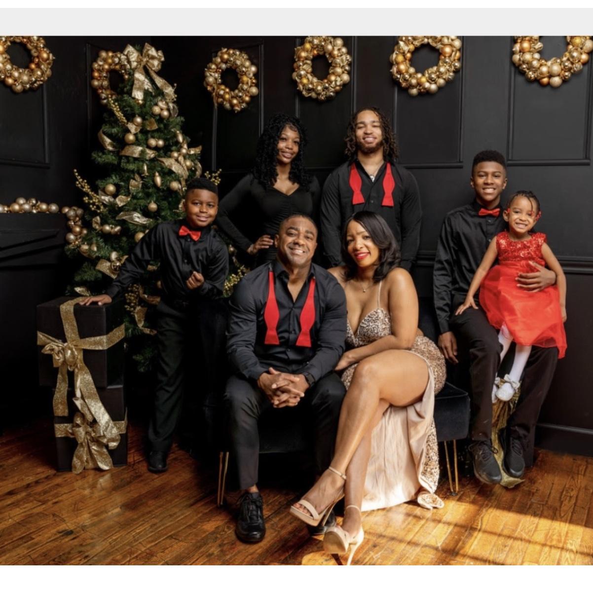 All smiles, all love, all together.  This blended family photo reflects love, unity, and the joy of coming together as one.