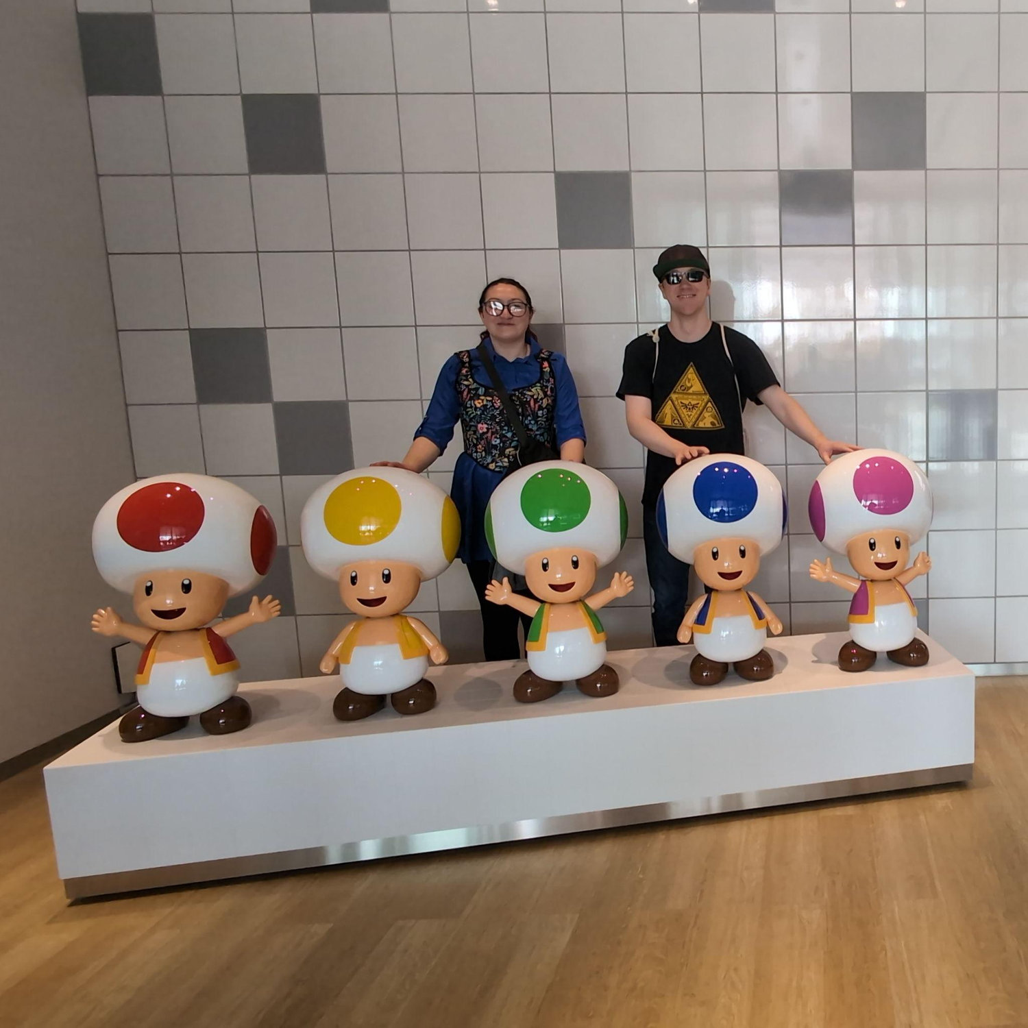 Posing with different colored Toads at the Nintendo Museum in Kyoto. Sarah had to enter a draw and then wait until midnight for a few nights in a row to try and get tickets.