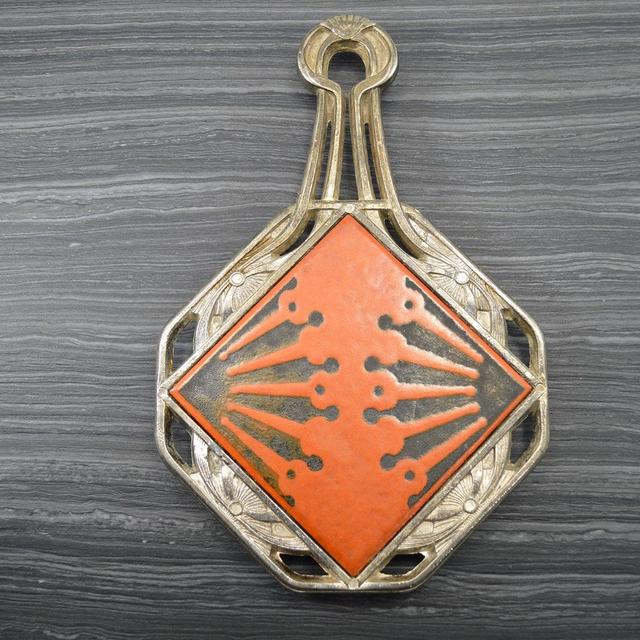 Vintage Art Deco trivet silver toned metal...