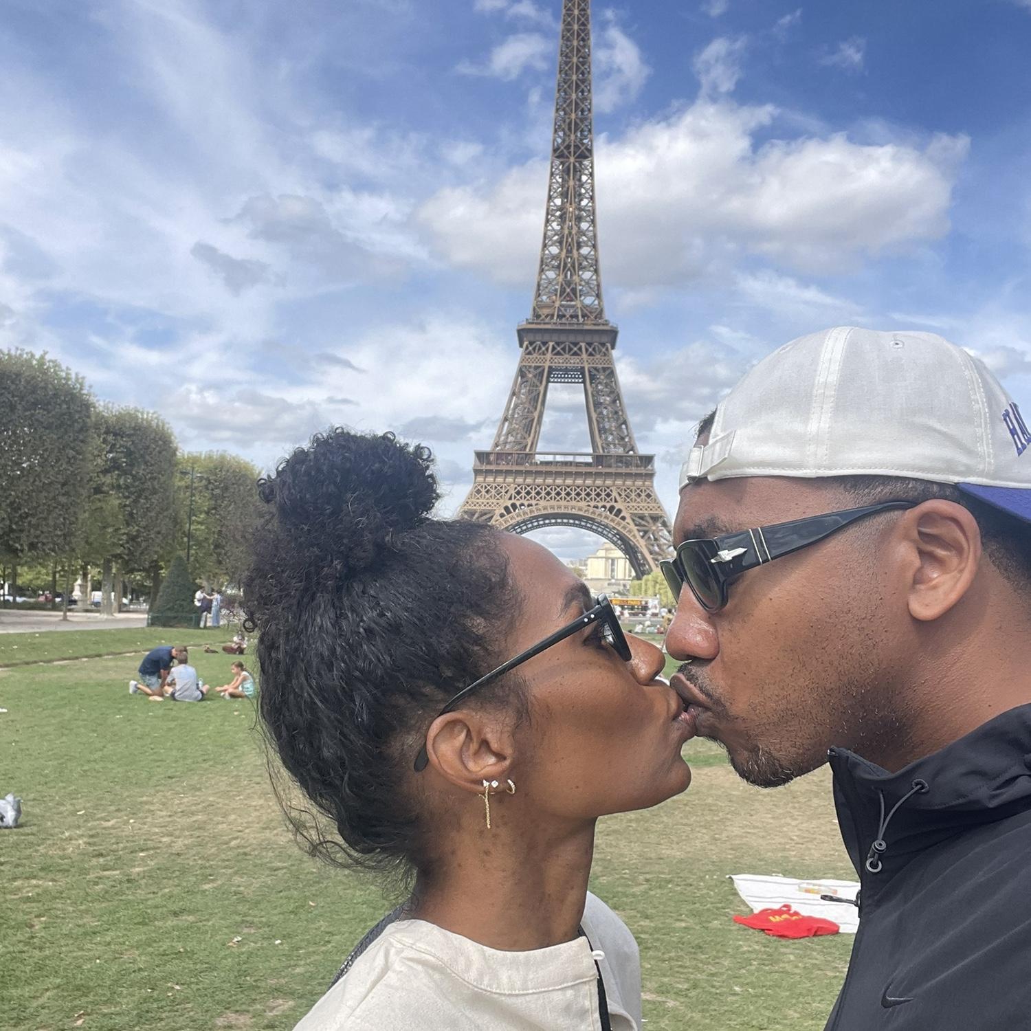 A kiss in front the the Eiffel Tour is essential.