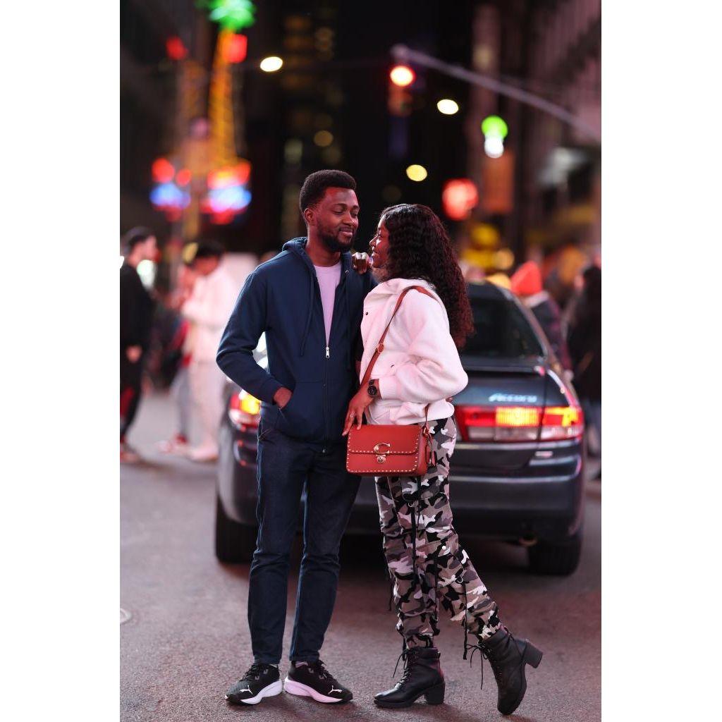 Joy’s first New York adventure — with Dozie as the best Times Square tour guide.
