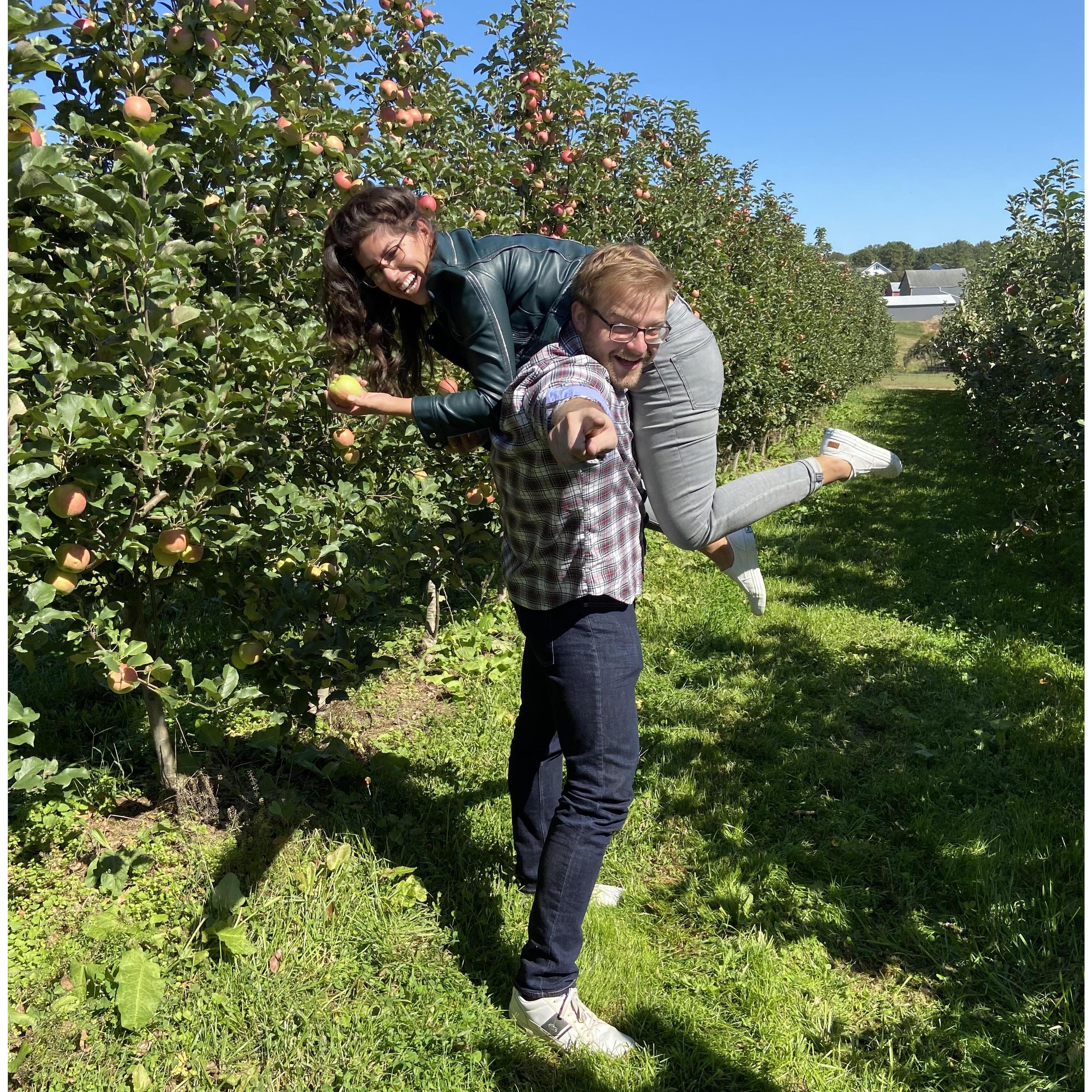 Edward "helping" Felicia pick apples - September 2020