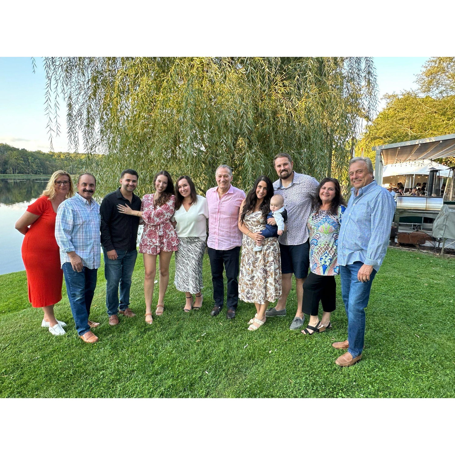 Anthony pulled off the ultimate surprise — both of our families joined right after he proposed, and we spent an unforgettable evening celebrating on the lake.