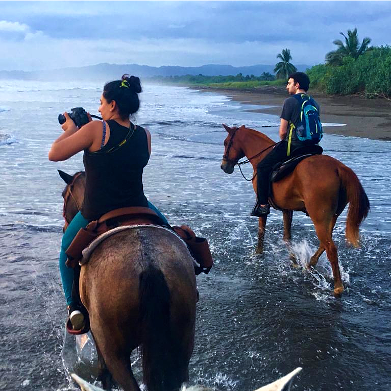 Sunset horse ride along the Pacific in Costa Rica, December 2019.