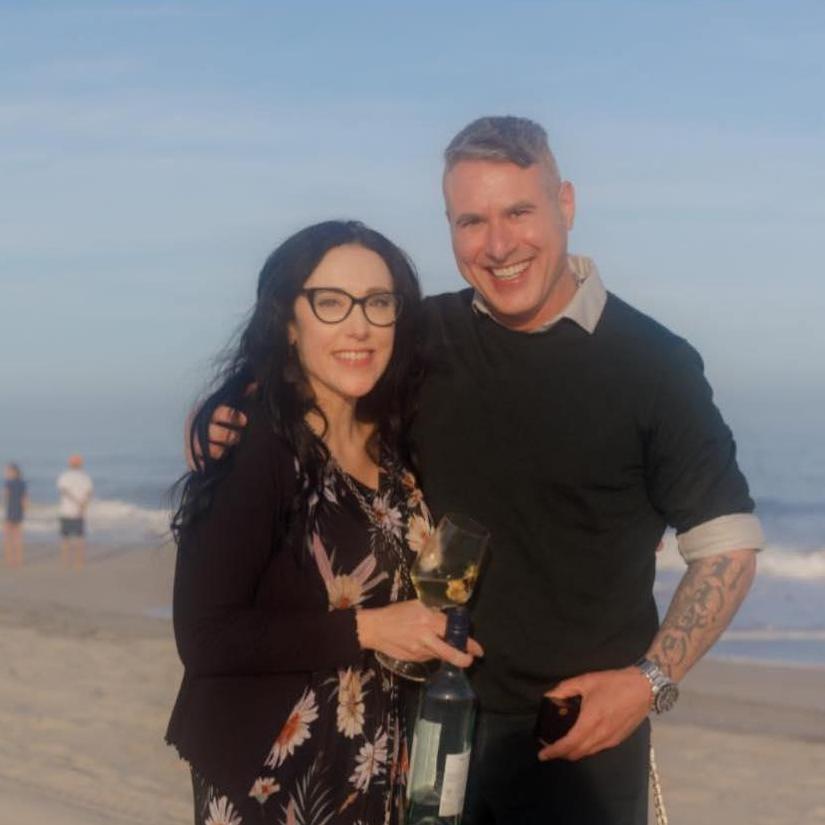 He asked beneath the Cape May sky, The waves, the breeze, the tide drifting by. The world stood still, my heart said yes- A perfect moment, love's soft caress.