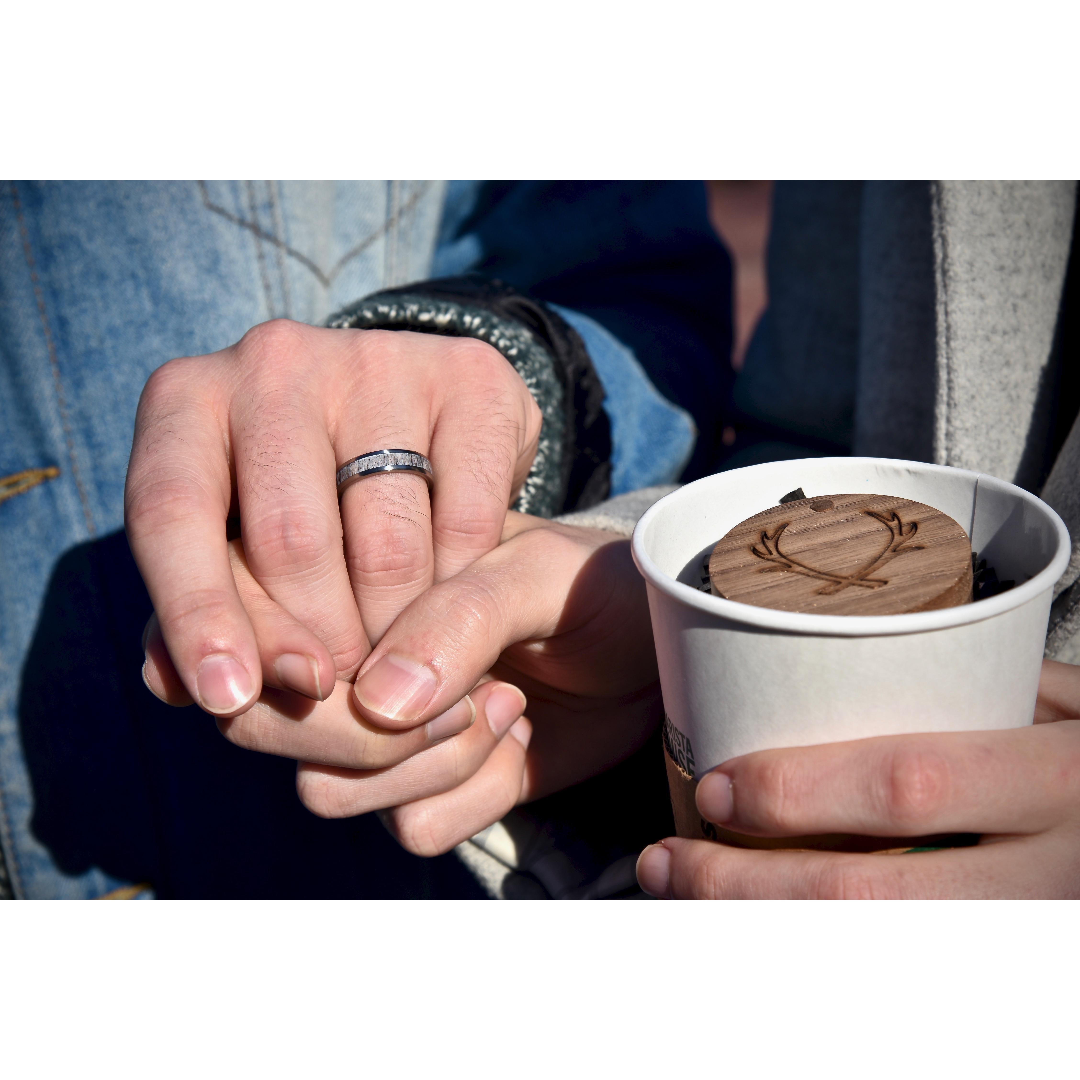 Nick's ring, made of reindeer antler, which Josh gave him hidden in a Starbucks cup.