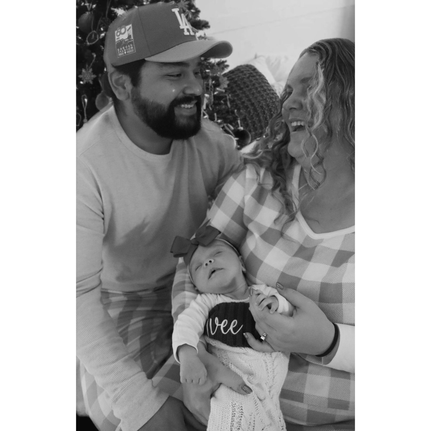 November 2025: First family picture. First everything together. Love our girl!❤️