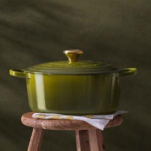 Le Creuset Signature 8-Qt. Olive Enameled Cast Iron Oval Dutch Oven | Crate & Barrel
