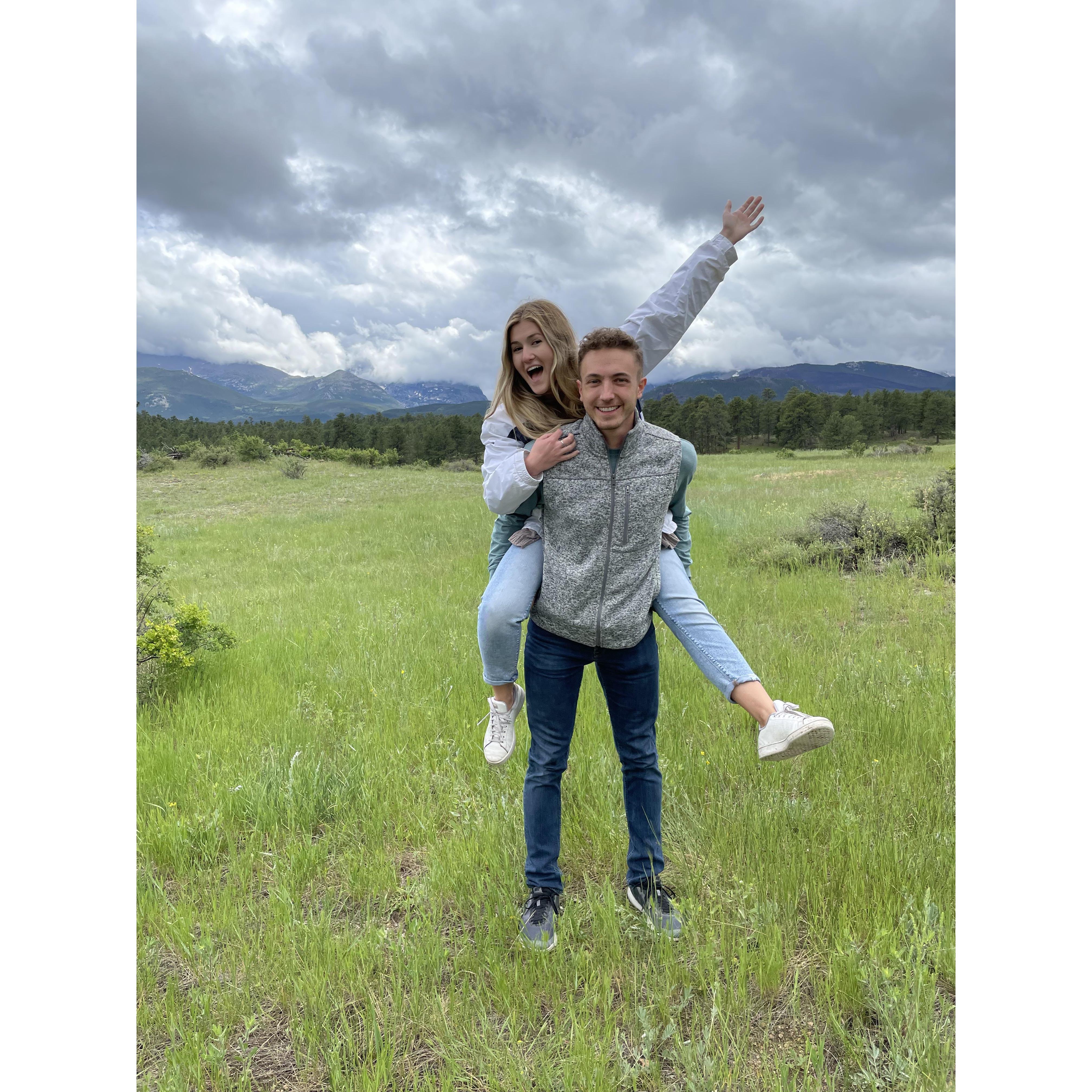Outside of Rocky Mountain National Park! He picked me wild flowers that I accidentally left in the rental car. :(