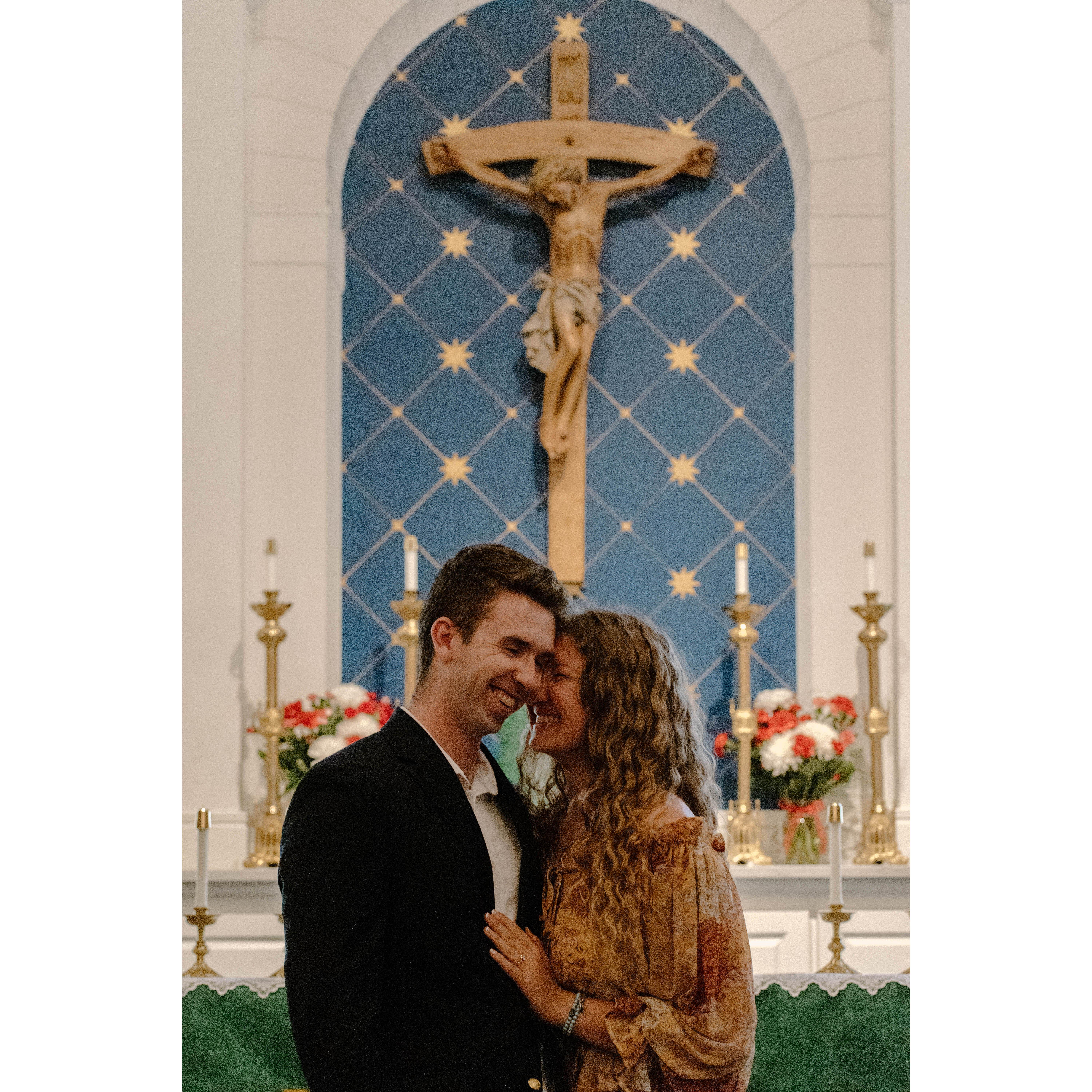 This photo is truly the only one worthy of a caption-this photo is the heart of our relationship. We lean into one another, smiling, at the foot of the cross of Jesus Christ.