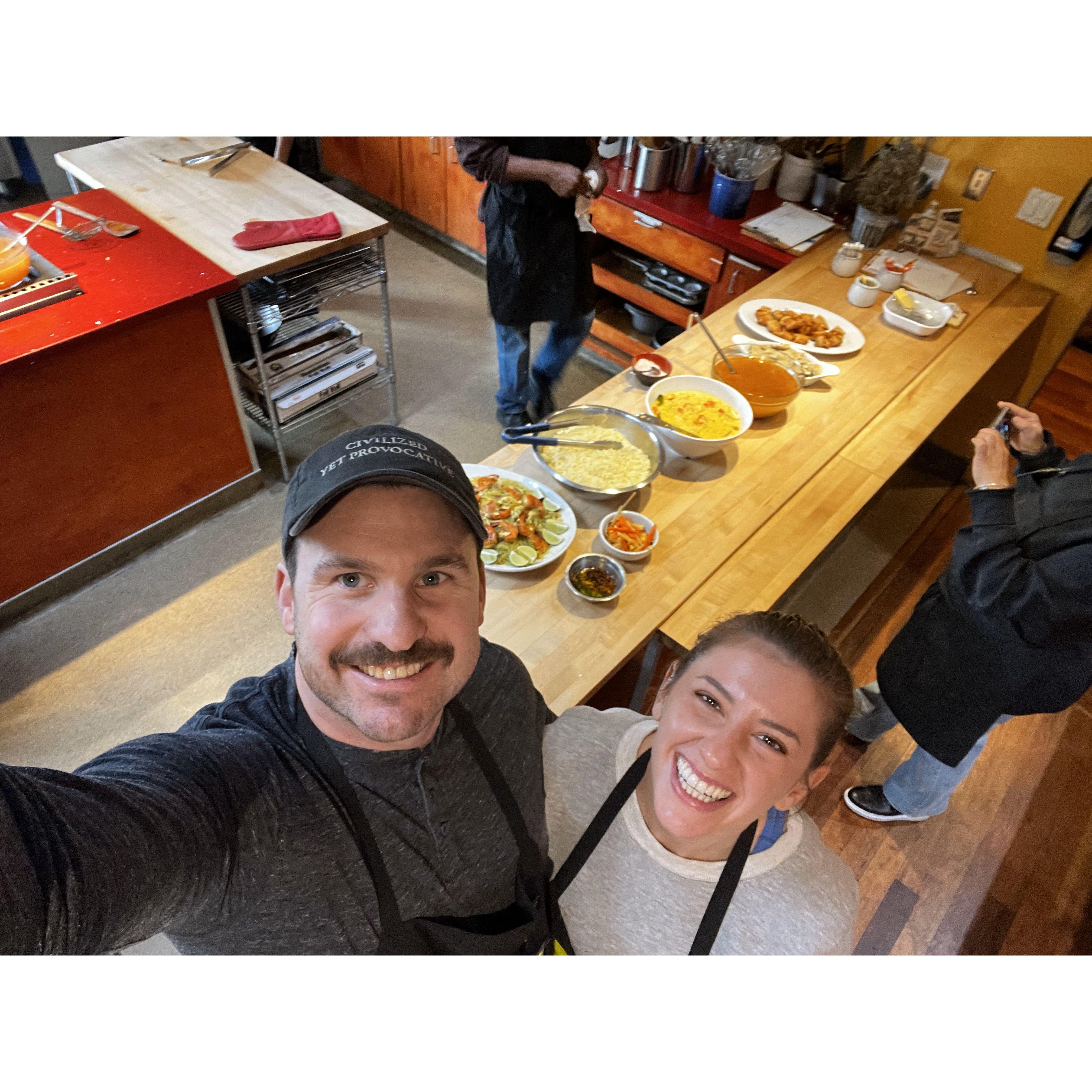 Cooking class in Berkeley - Burmese dishes pictured behind us. January 2025.