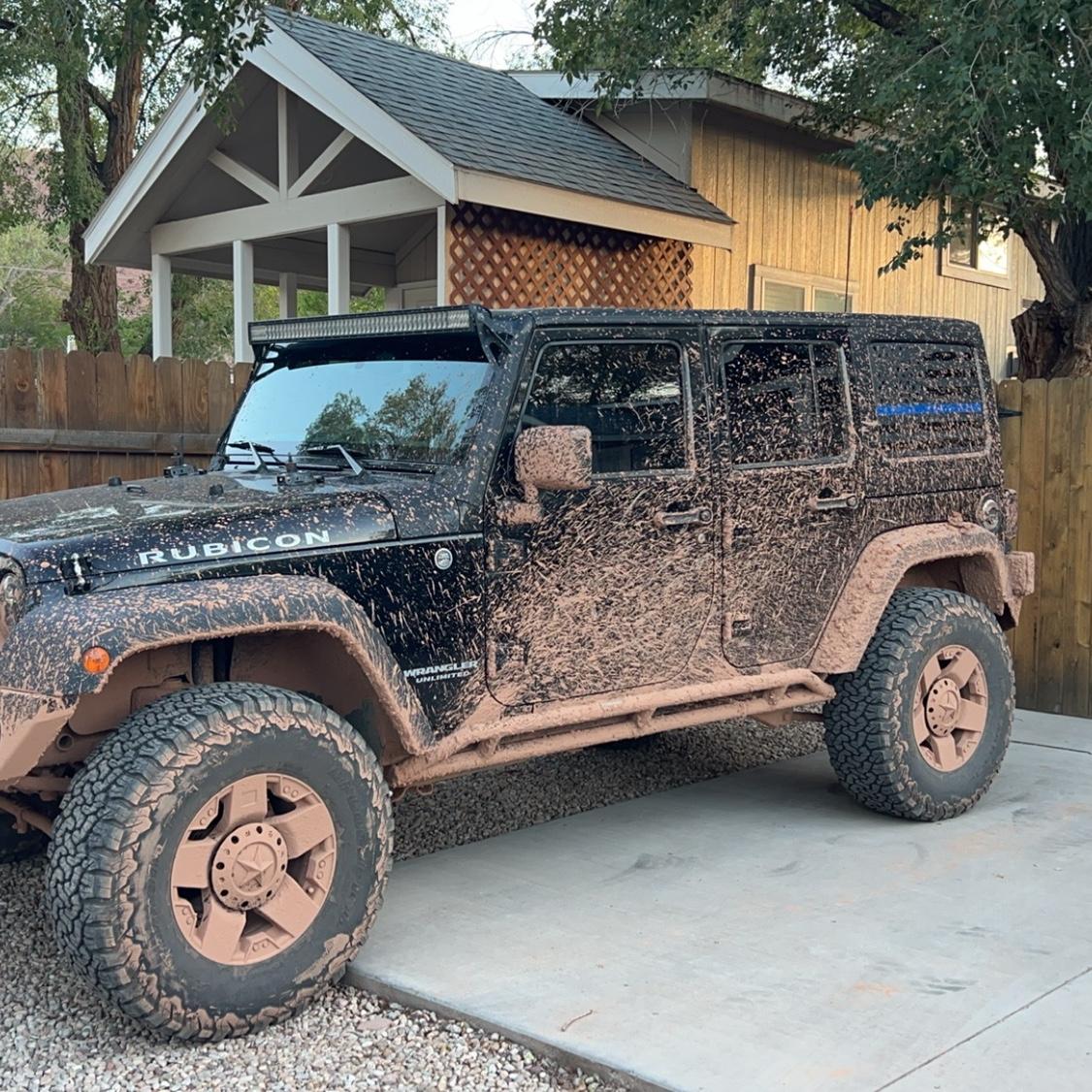 Outside of our Airbnb in Moab after we found some mud
