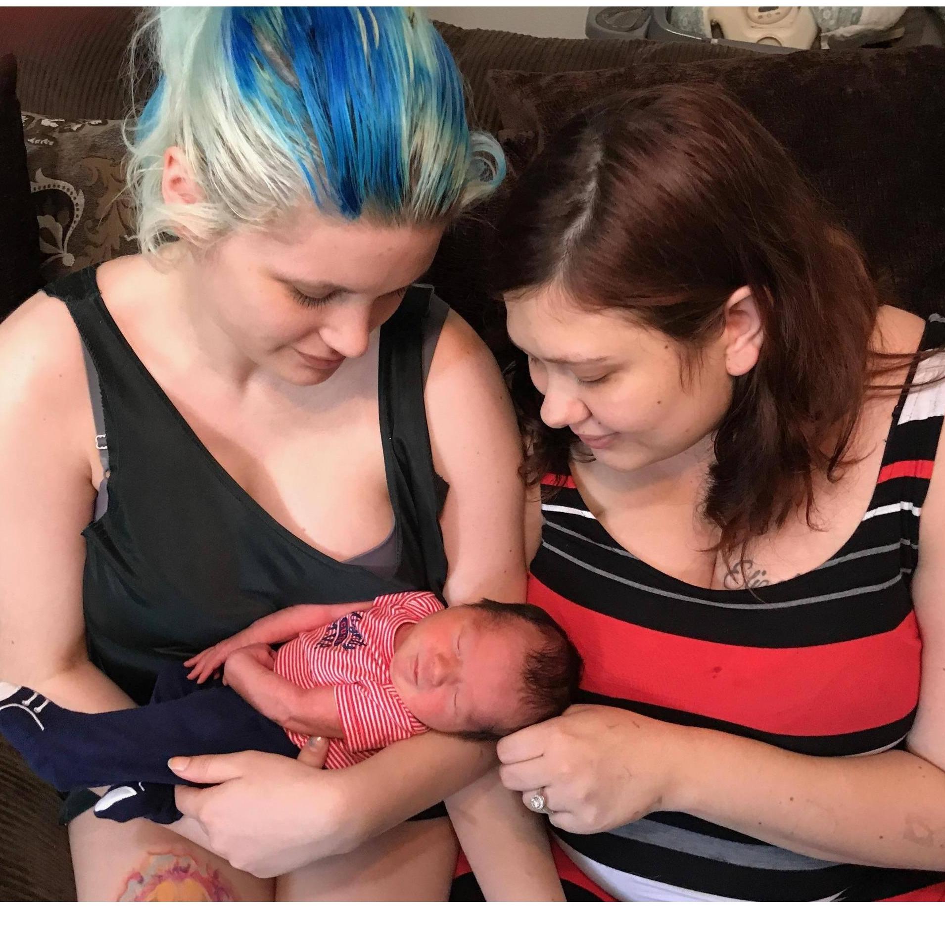 Annika and Xenia holding baby Caspian (annikas son)