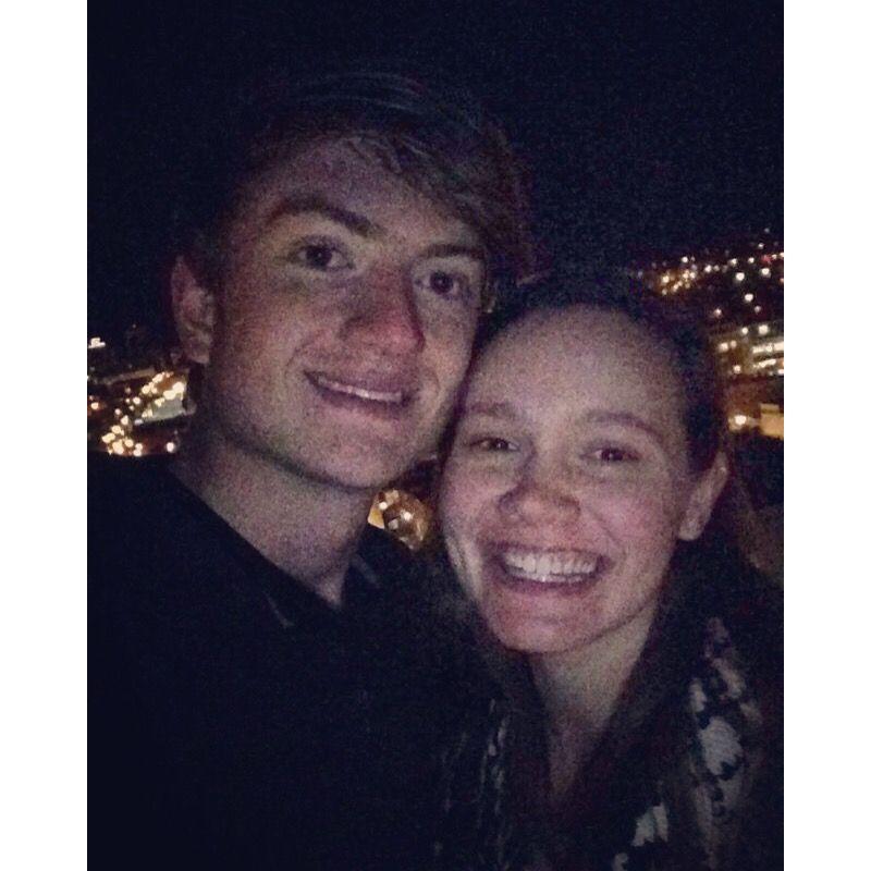 Jake and Addie's first anniversary picture taken on a rooftop at VCU!