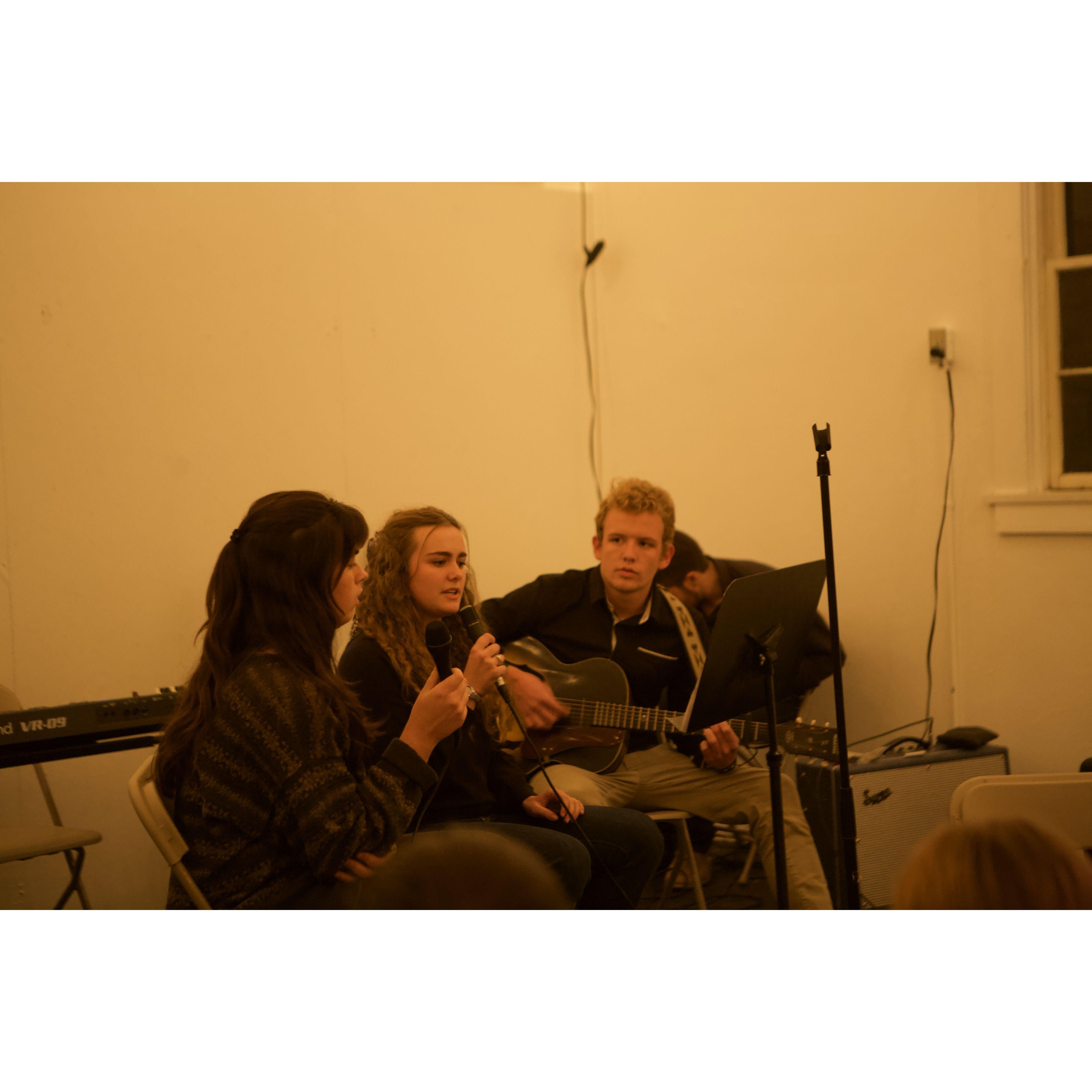 Open Mic Night, 2021. Joe played guitar for Lizzy's act, and met her mom for the first time, still long before we started dating