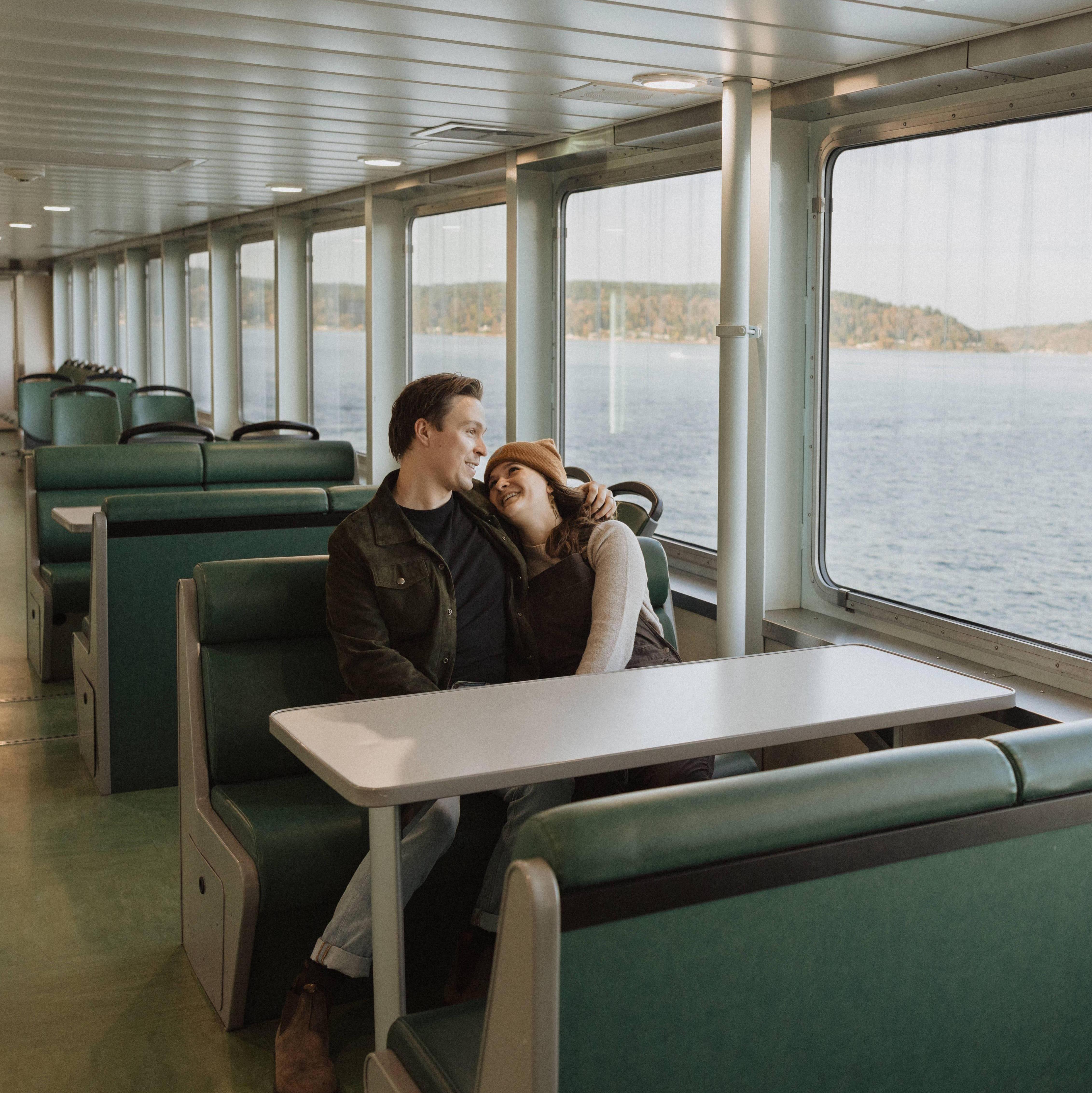 Engagement photos by In the Alpenglow on the Vashon Island ferry in Wahington in the fall of 2023.