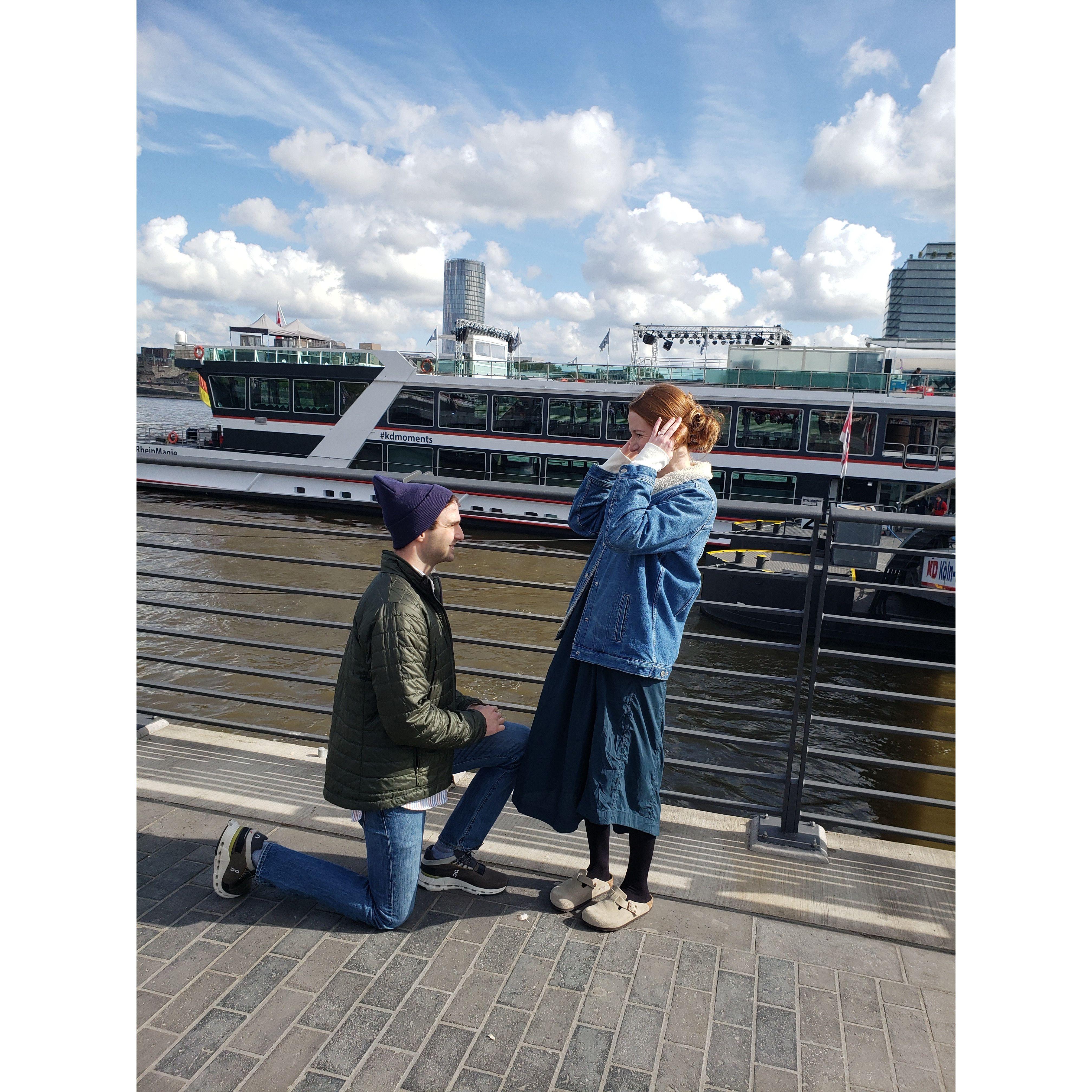 September 29th, 2024: A very special surprise during our Europe trip to Amsterdam, Cologne, and Bruges! Chris proposed on a walk along the Rhine River with Jakob and Karen.