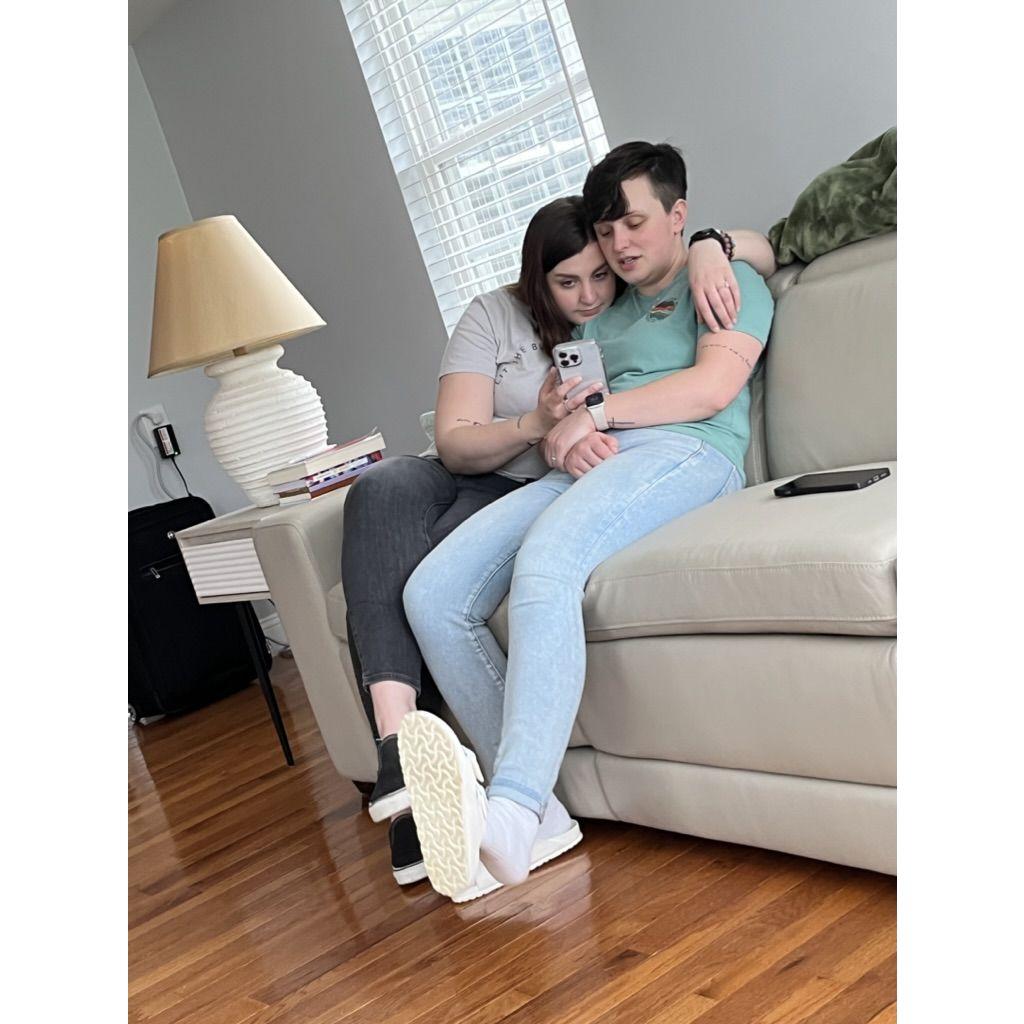 ...and cuddled up on the couch that came from the deal of a lifetime.