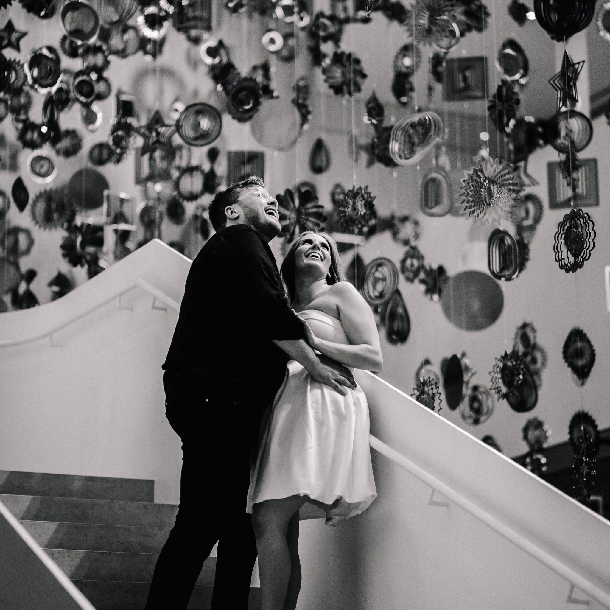 We did a Save the Date Photoshoot at the Remai with Cherish the Moment Photography, and this is one of our favourites!