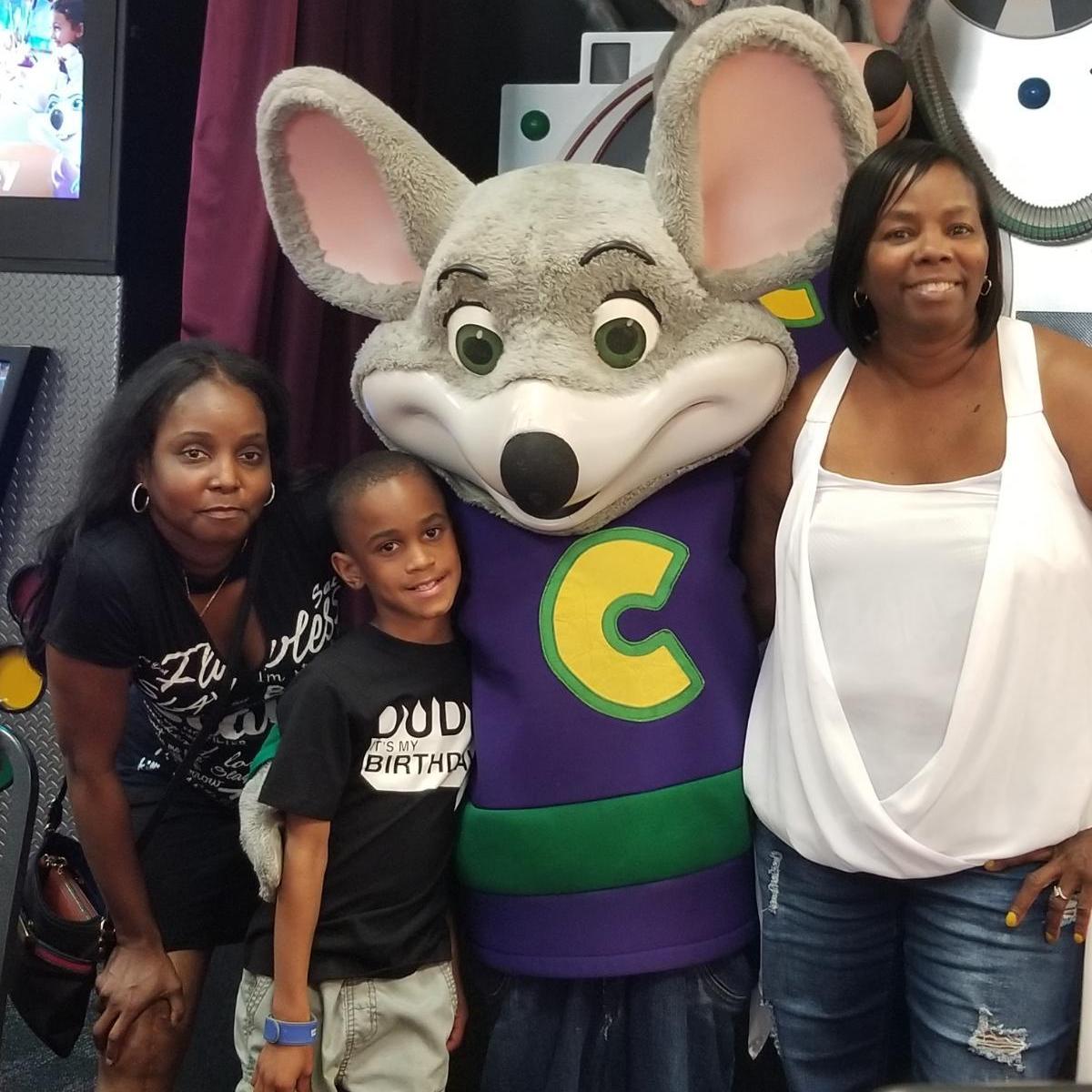 Trina having fun with Keya and Aiden at Chuckie Cheese