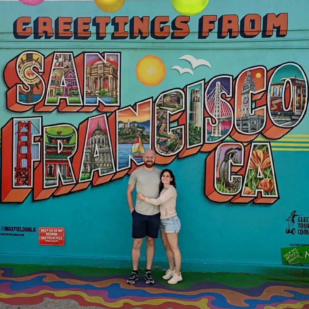 During a weekend trip to San Francisco, we stopped to pose by a mural during an afternoon with our friend Nathan.