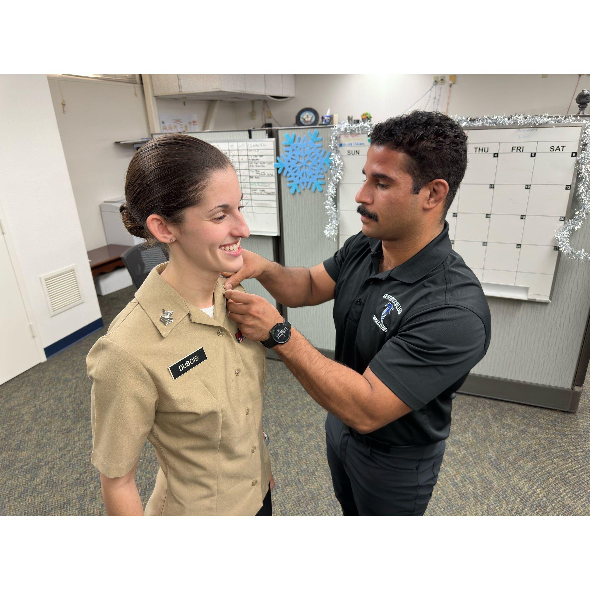 Orlando got the honor of pinning Claire to Petty Officer First Class during her frocking ceremony in December.