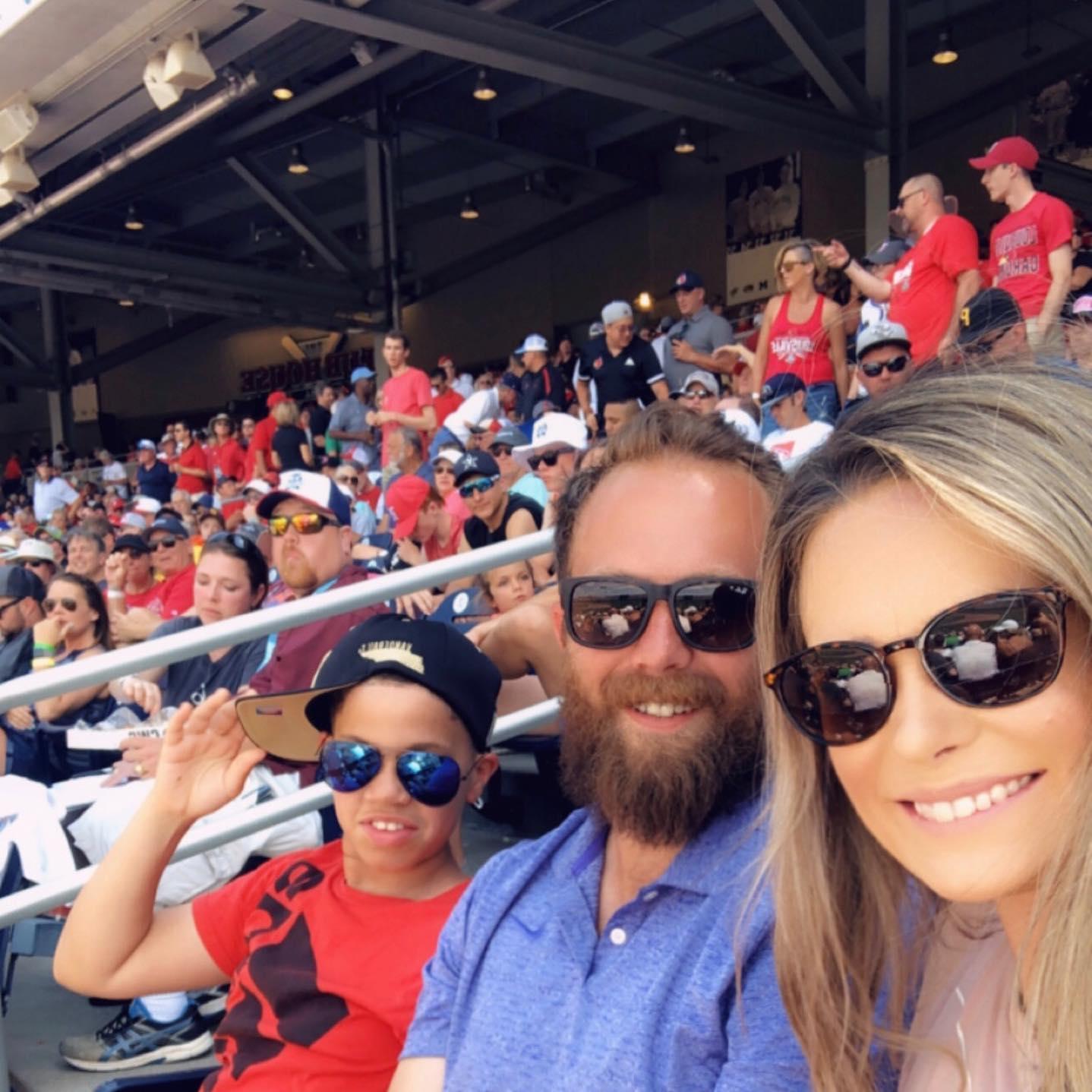 Bringing Zeven, one of Ashley's former patients and now our mentee, to a CWS game last summer.