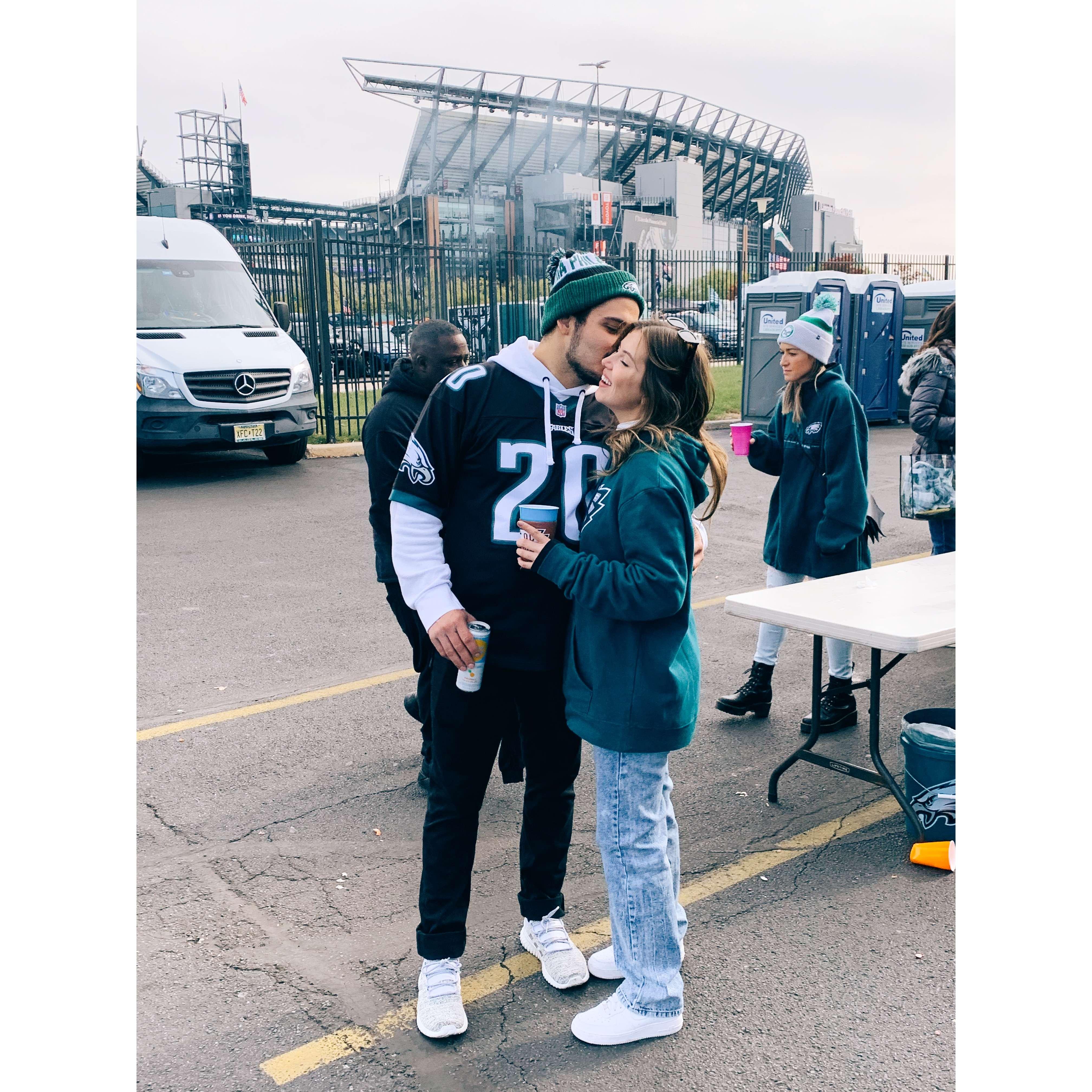 Sarah surprising Francesco by showing up to this tail gate with his friends and family!