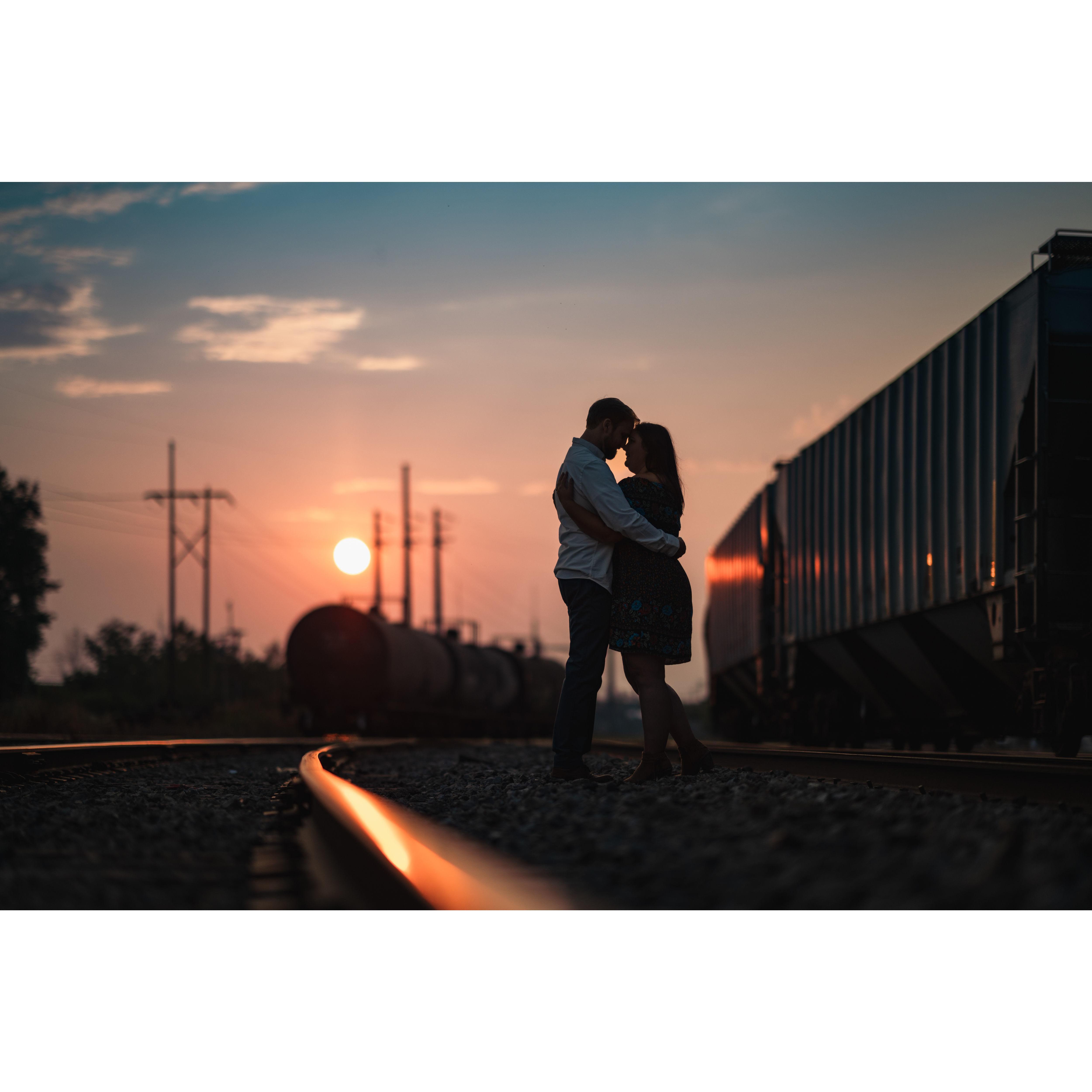 Engagement photo on the train tracks behind Tifft Nature Preserve