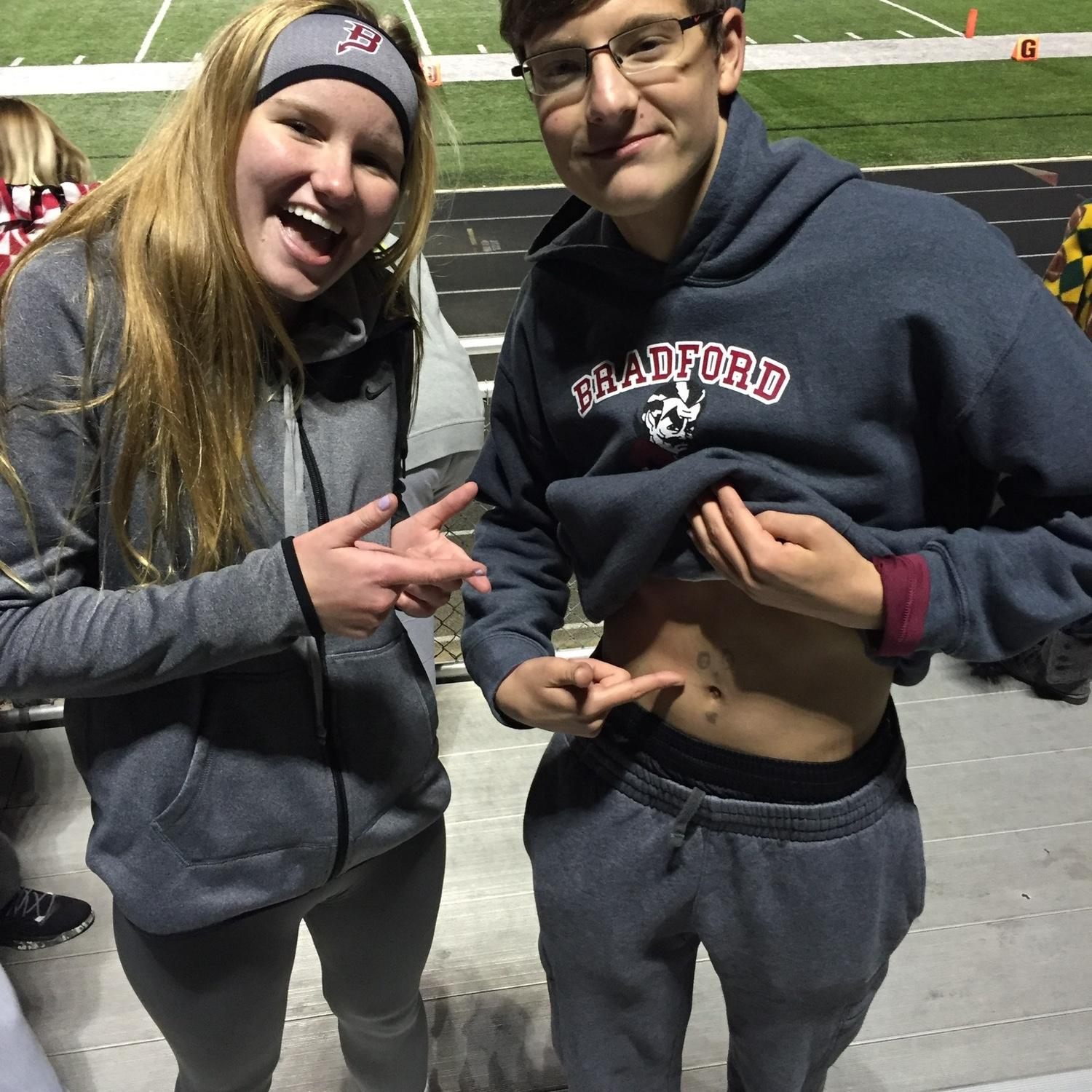 One of our very first pictures together at a high school football game. Both 15 years old
