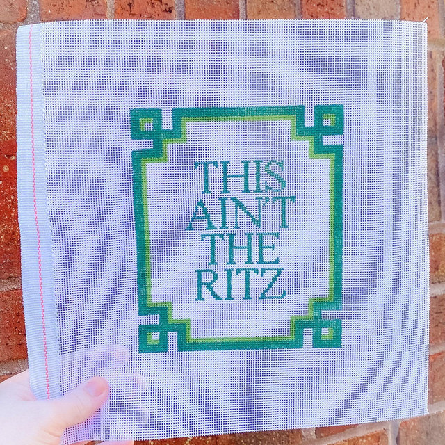 Hand painted 18 mesh needlepoint canvas - This Ain't the Ritz - with greek key border