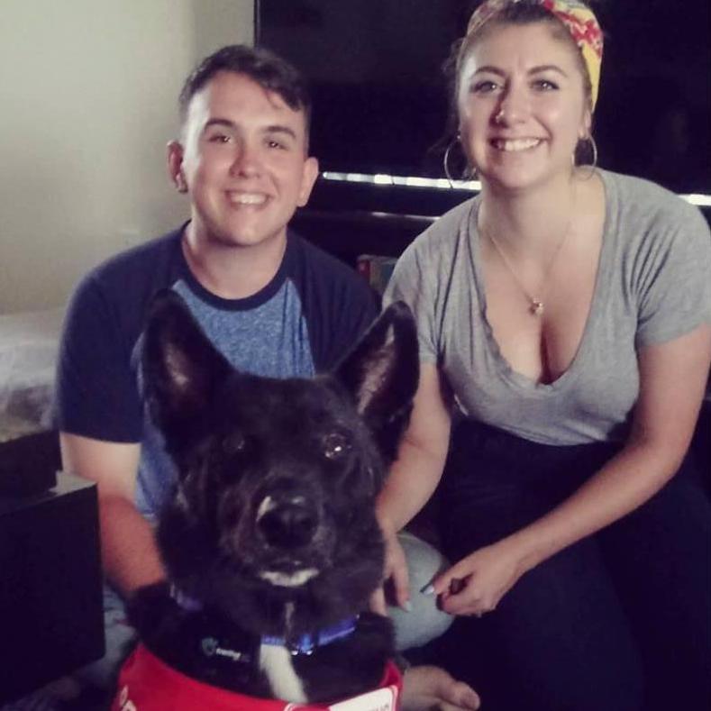 Vince and Anna on the day they adopted their first fur baby, Bruce