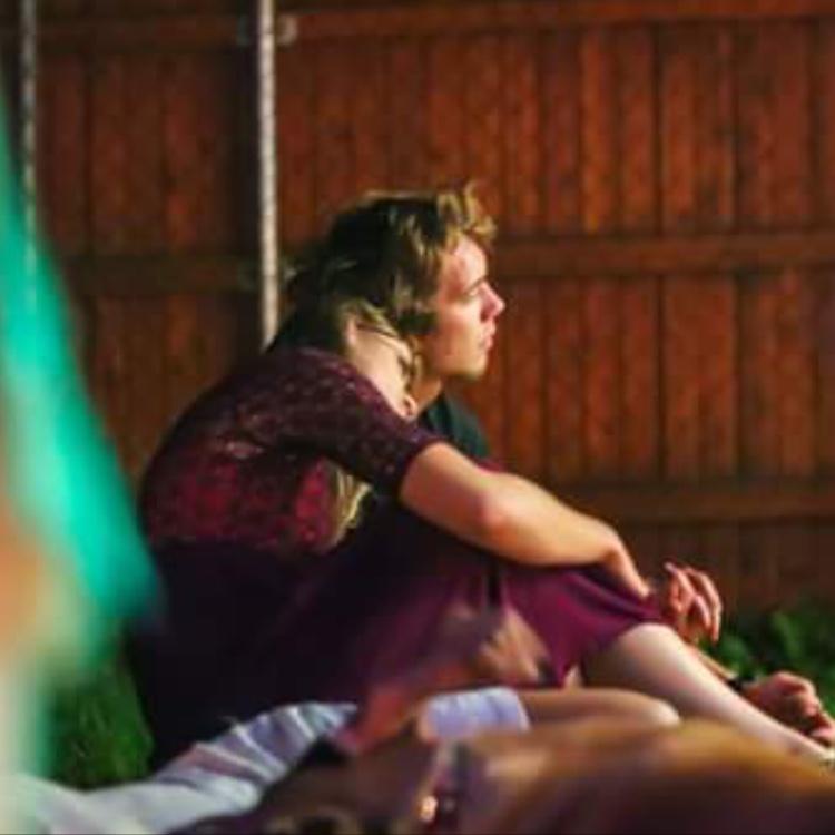 Candid photo from a backyard concert the week we met, 2017
