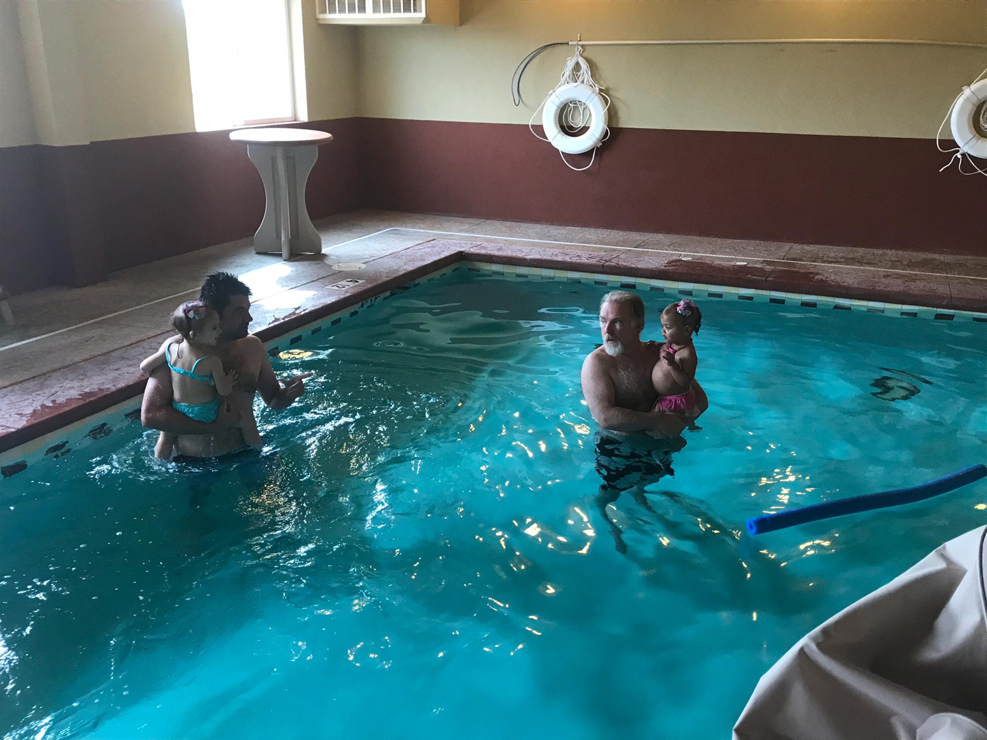 Bob, Daniel, and the girls swimming
