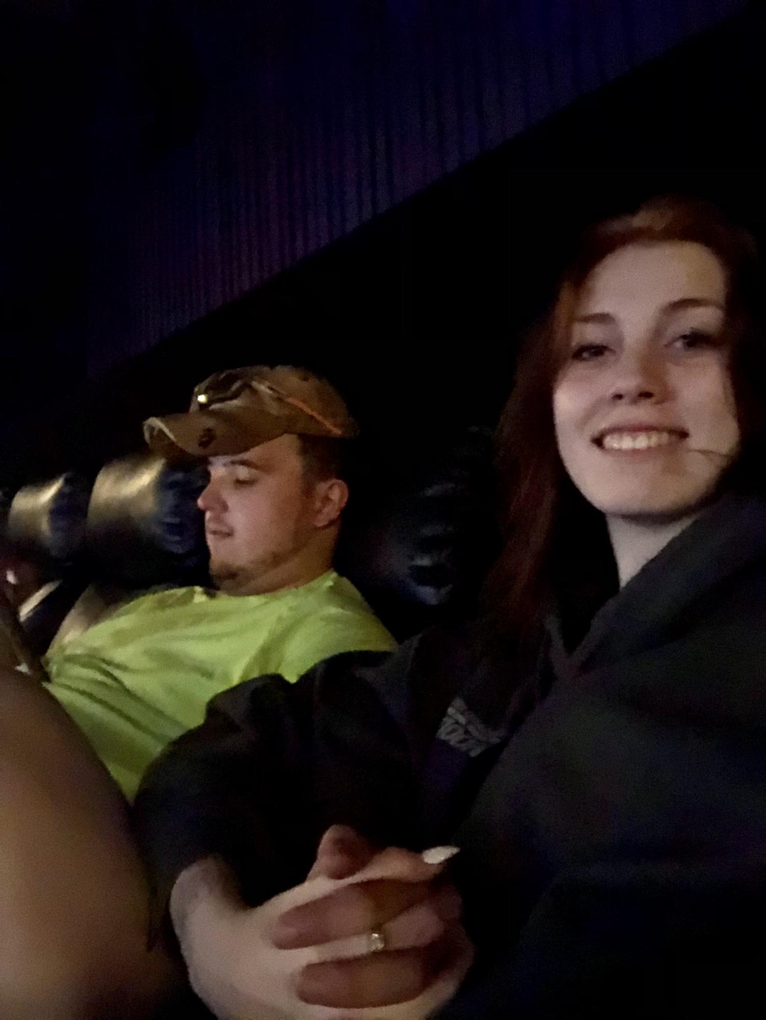 The day after the groom proposed, the groom and bride went to the movies to celebrate.