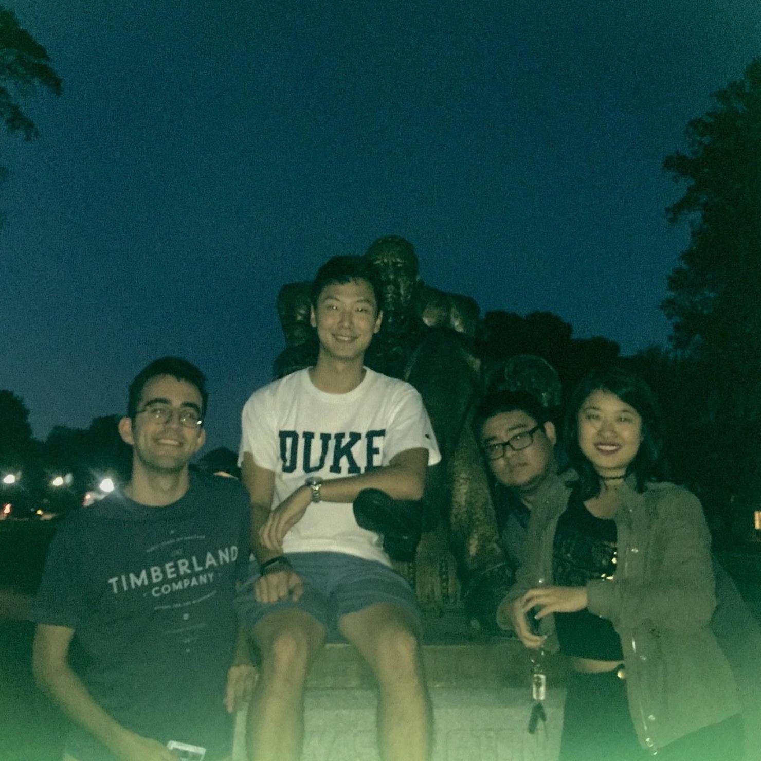 This blurry picture was taken at our APO brotherhood bonding week. Coincidentally we were in the same team and had to pose with this statue for points :)