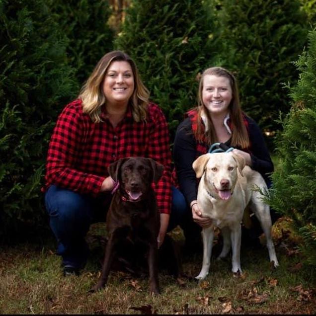 First ever photo shoot with our dogs. Right before this Laika escaped her leash and went sprinting through all the Christmas trees.
