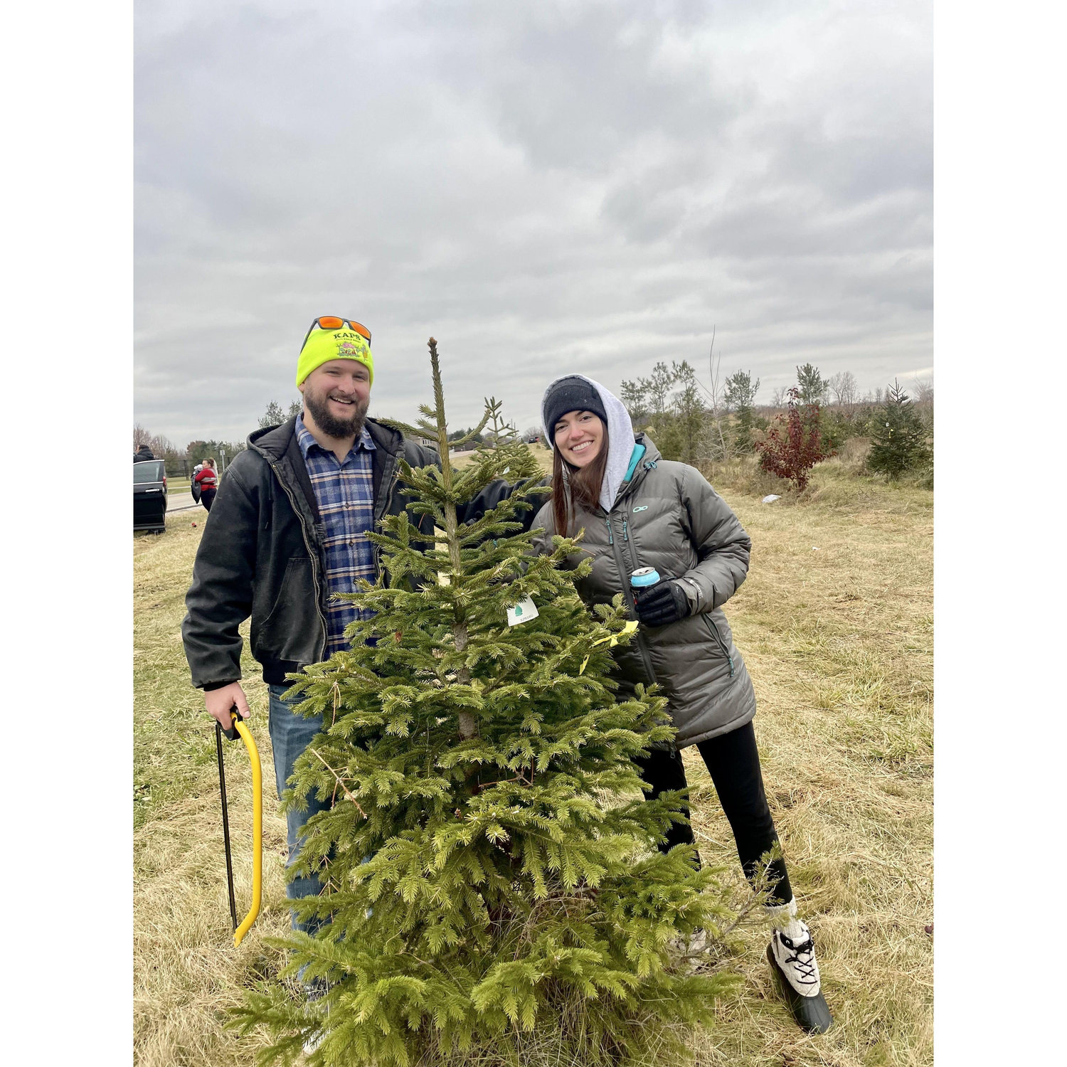 Chopping down our first Christmas tree in the Chicago suburbs
