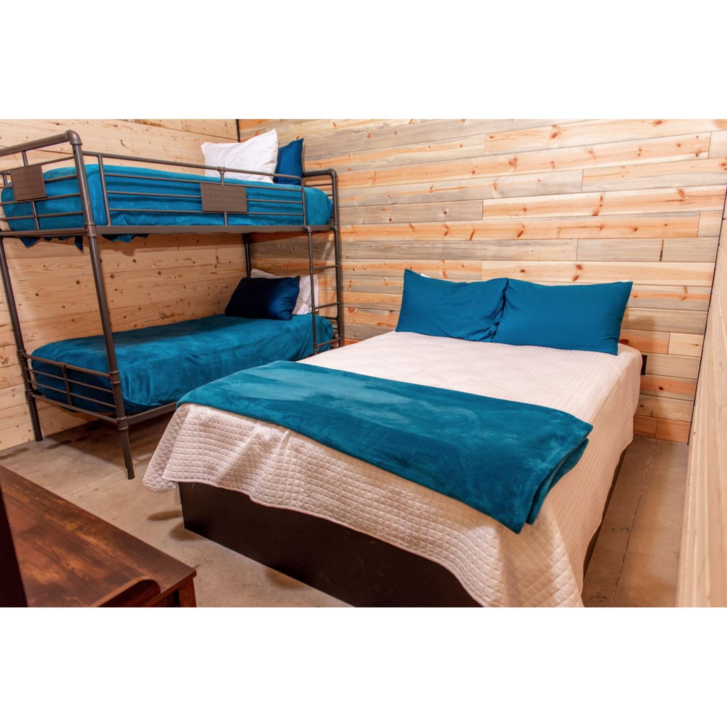 "Misty" and "Luna" have identical room set ups. Both have a queen bed, and a bunkbed. Sleeps 4.