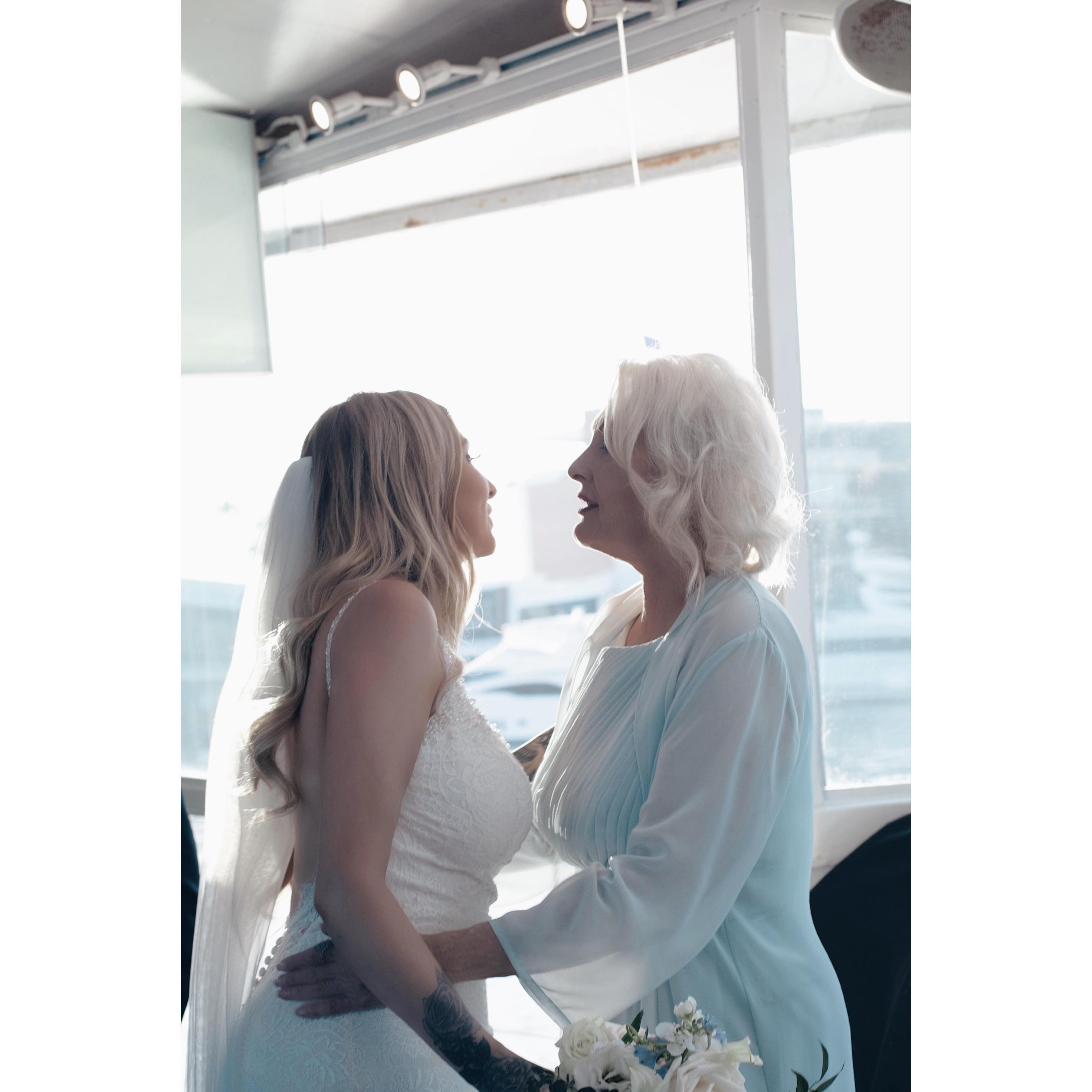 Hugs after the ceremony with mom.