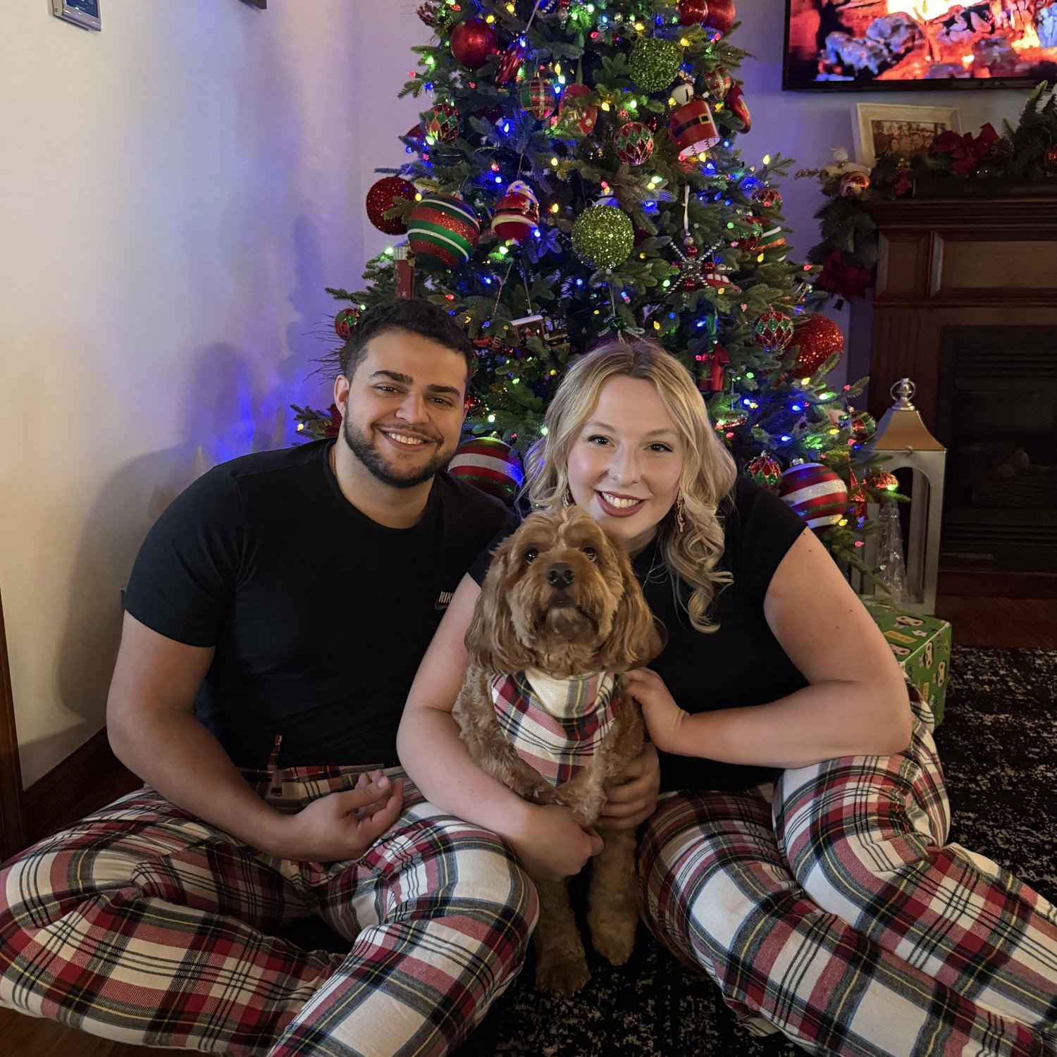 Family Christmas photo- featuring matching pajamas and our beloved four-legged son, Remi, who is not even a little bit spoiled!!