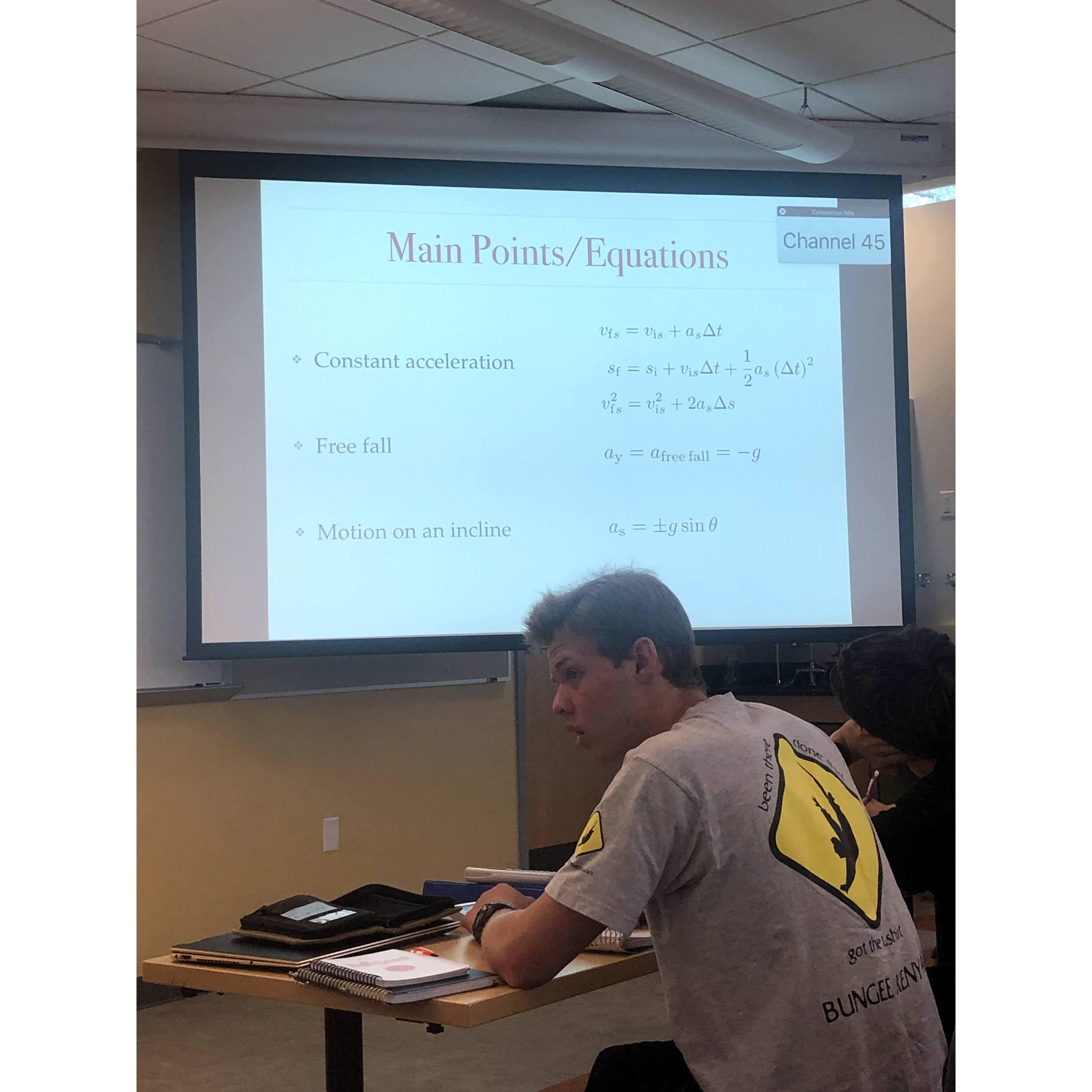 Where it all started... physics class at Wheaton College, August 2019. Tamara was taking a photo of the equations. Joey was apparently listening.