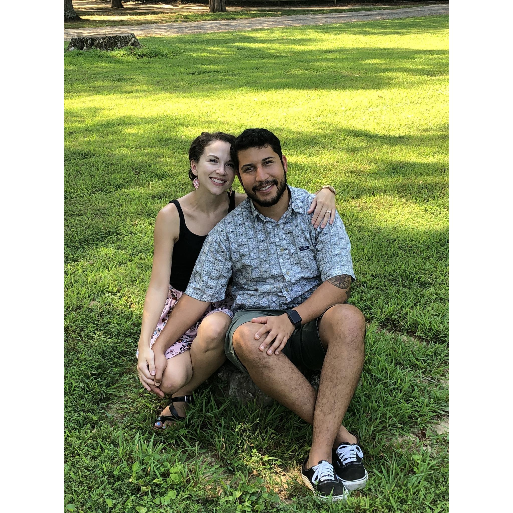 Sitting on the stump where they first met.