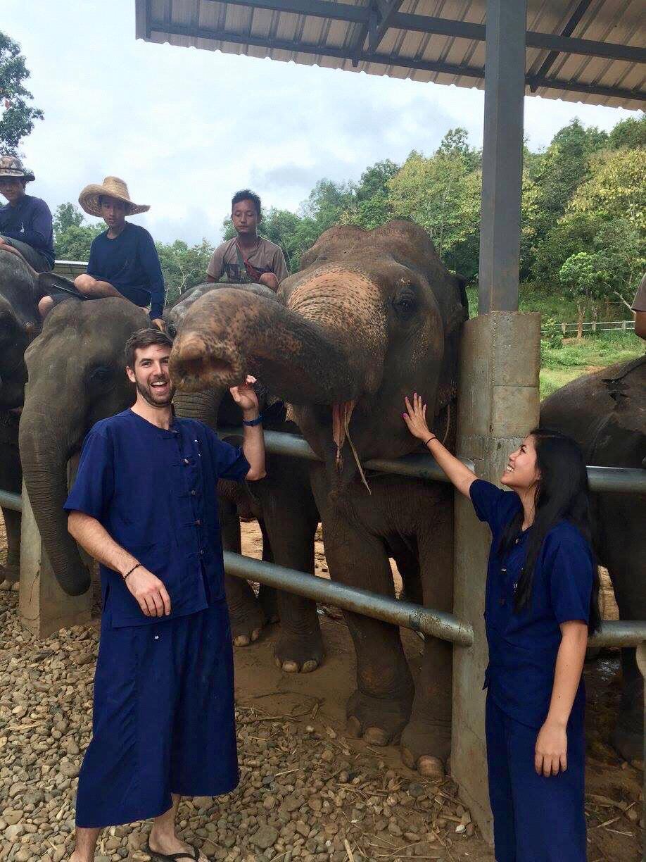 Playing with elephants at the Baanchang Elephant Sanctuary in Chaing Mai, Thailand.