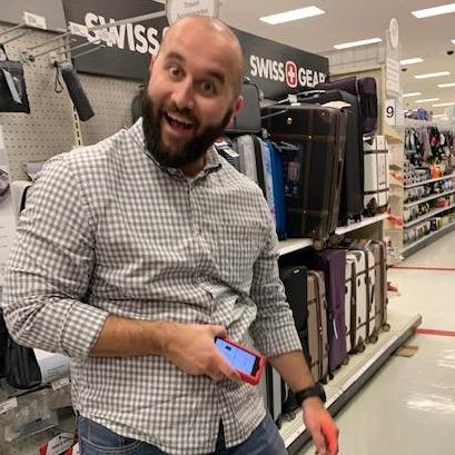 Our first registering experience! Matt sure loved the gun.. please disregard any snickers on our registry list ;)