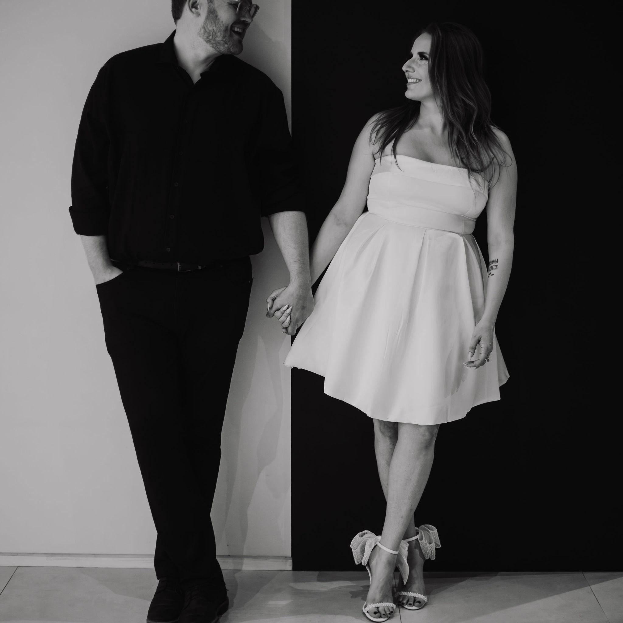 We did a Save the Date Photoshoot at the Remai with Cherish the Moment Photography, and this is one of our favourites!