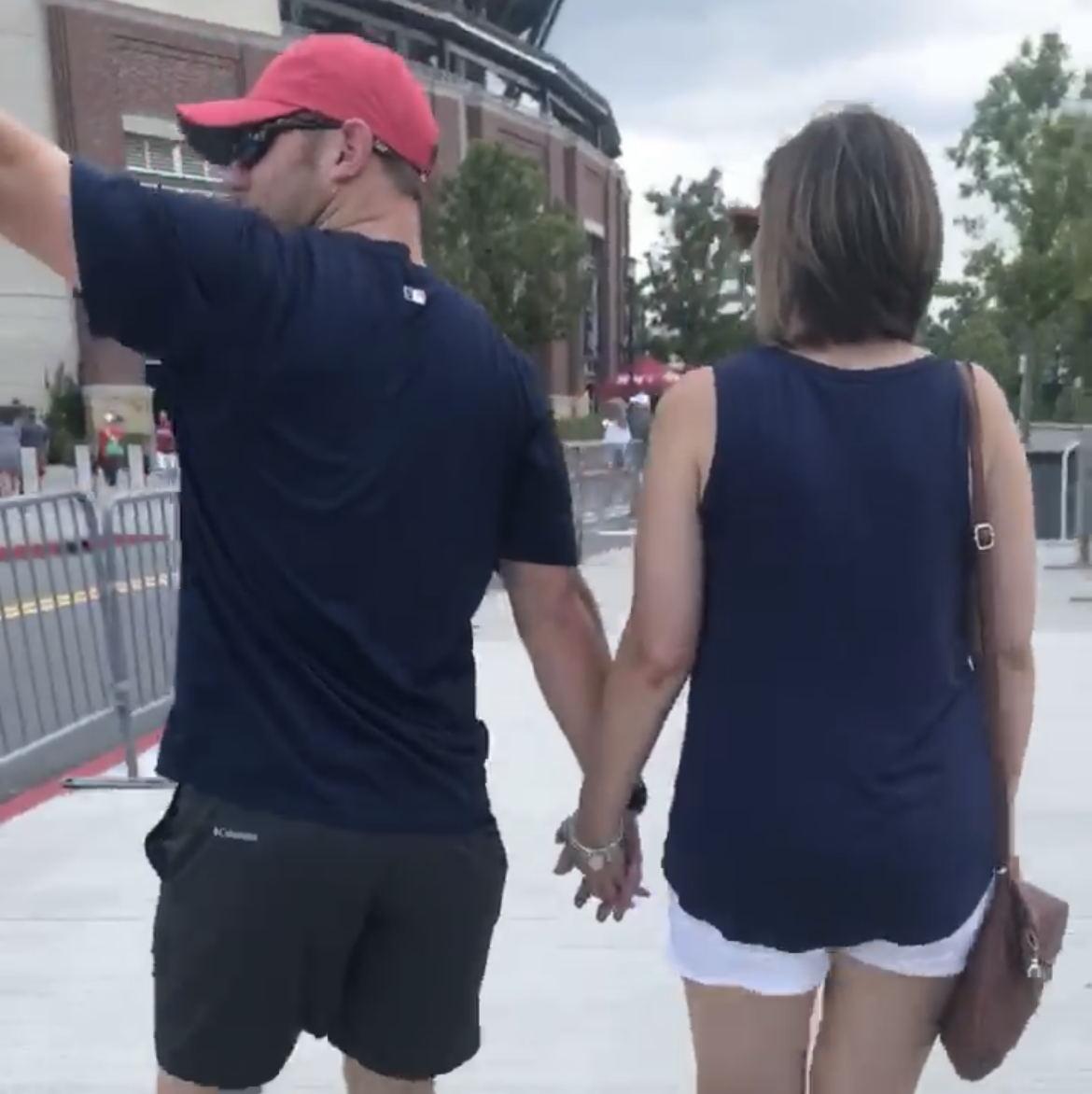 *THE* handhold at the Braves game that broke the news - we were dating! 